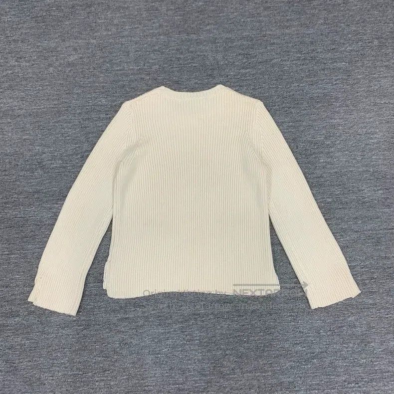 The Row White wool knit sweater