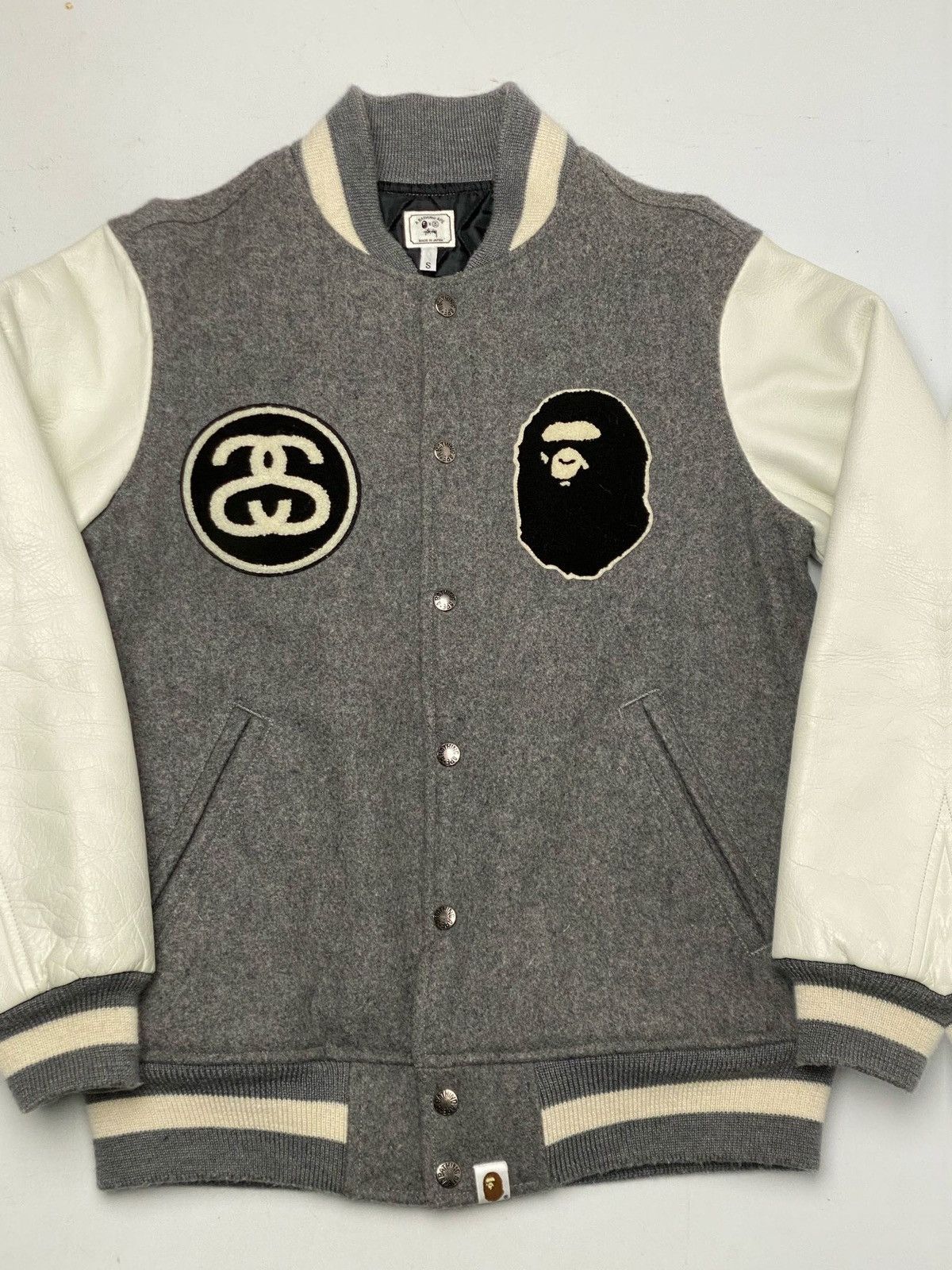 stussy x a bathing ape varsity