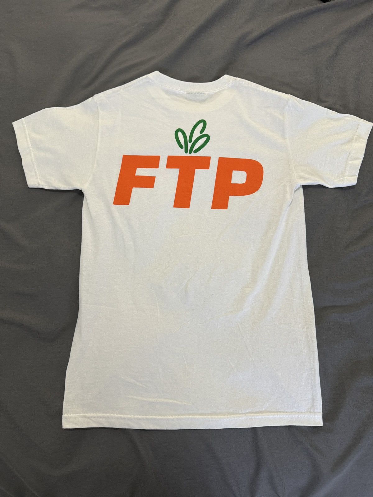 Carrots by Anwar Carrots × Fuck The Population Ftp x Carrots Logo Tee Size US S / EU 44-46 / 1 - 2 Thumbnail