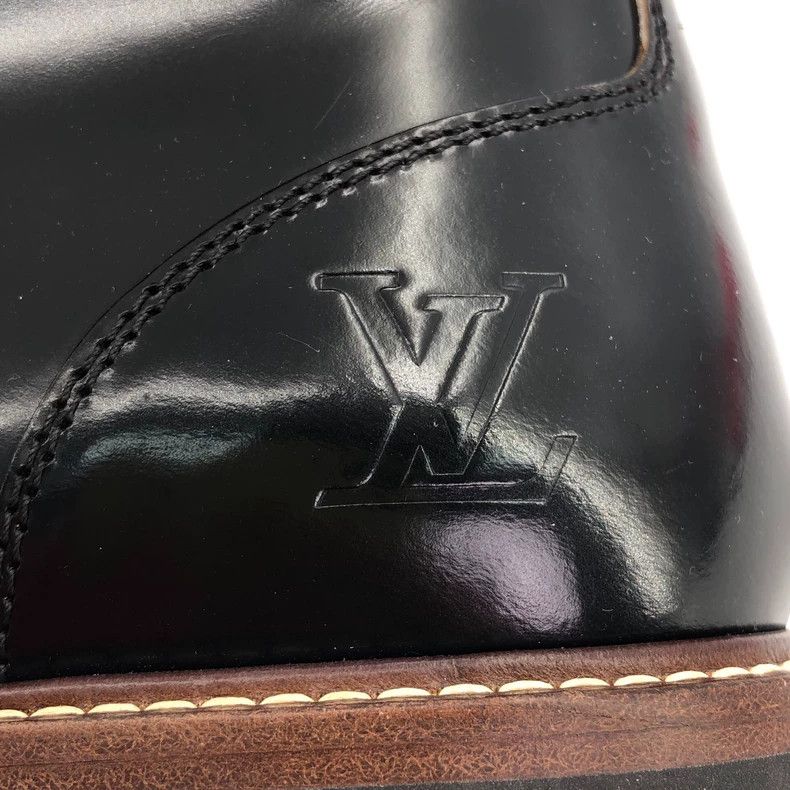 Louis Vuitton Black logo embossed leather lace-up Martin b