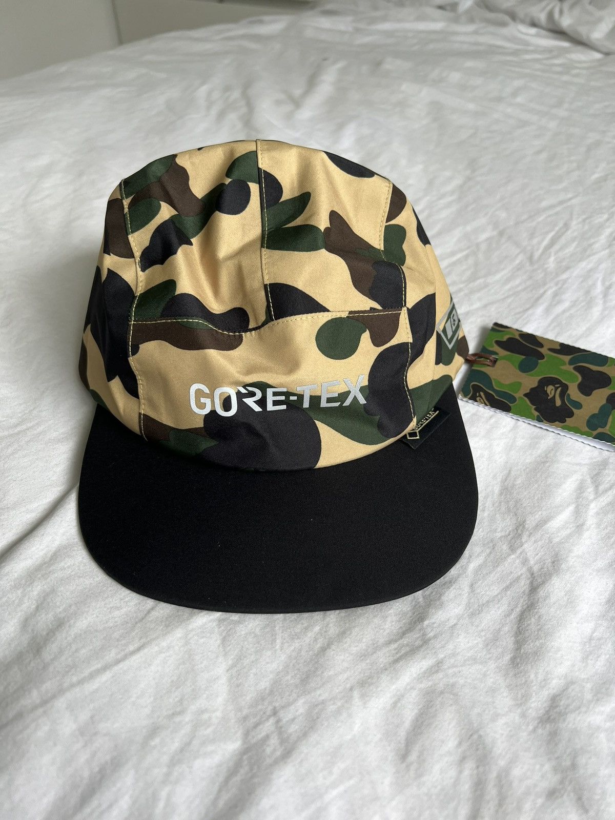 image of Bape Gore-Tex 1St Camo Jet Cap in Yellow, Men's