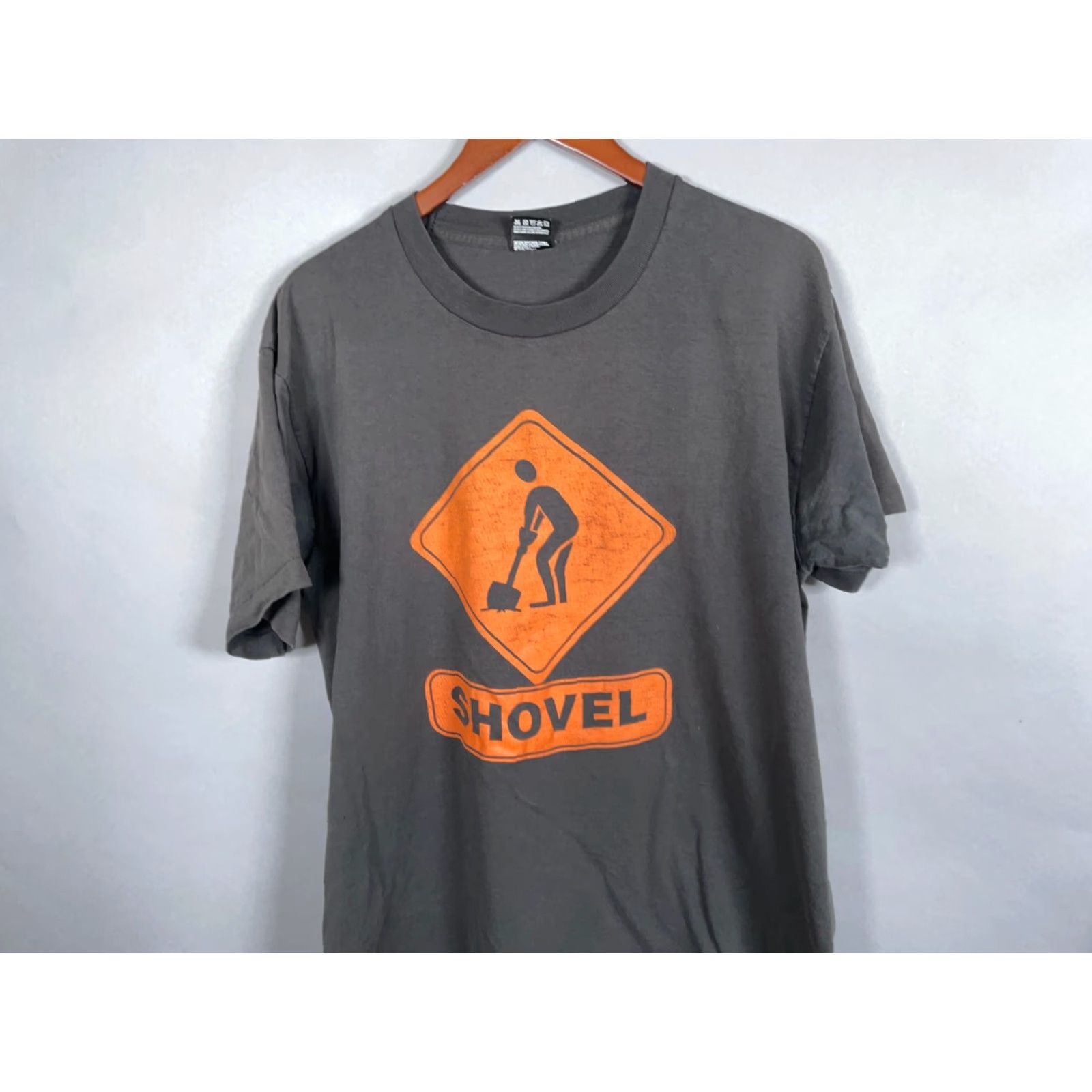Fruit Of The Loom VINTAGE Fruit of the Loom T-Shirt Shovel Road Sign Adult XL Black 50-50 Cotton-Polyester Single Stitch 1990s Retro Mens Size US L / EU 52-54 / 3 - 4 Thumbnail