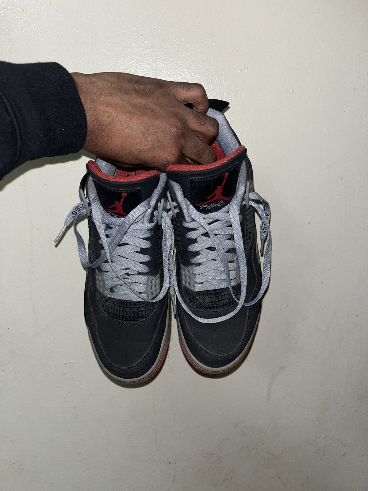 image of Jordan Nike Jordan 4 Retro Bred Shoes in Black, Men's (Size 9)