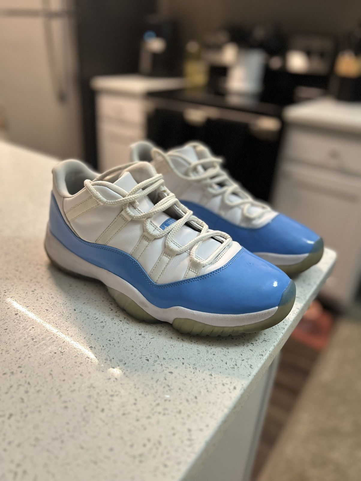 image of Nike Air Jordan 11 Low Unc Shoes in White, Men's (Size 11.5)