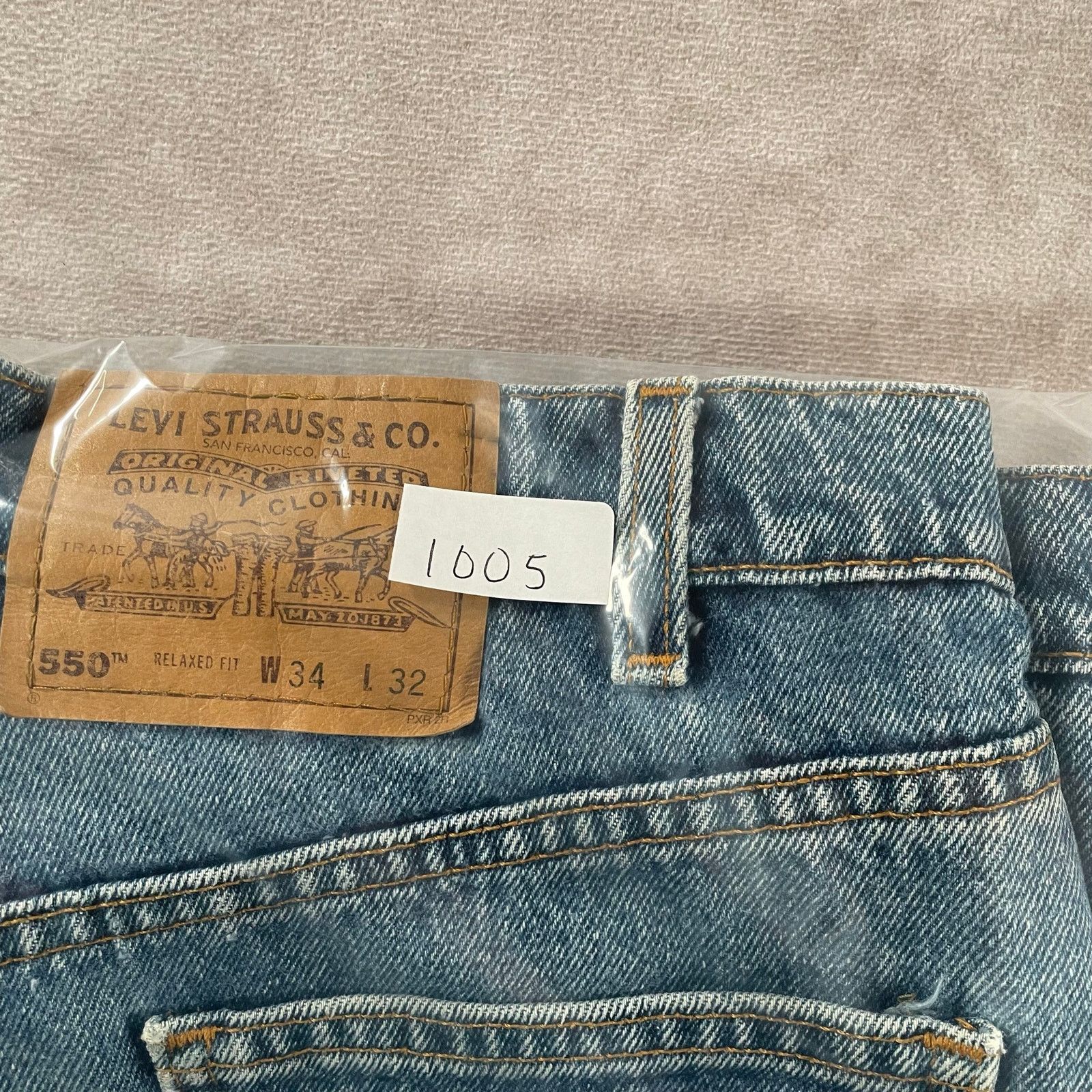 Vintage 90's Levi's 550 Orange Tab Relaxed Fit Jeans 33x31