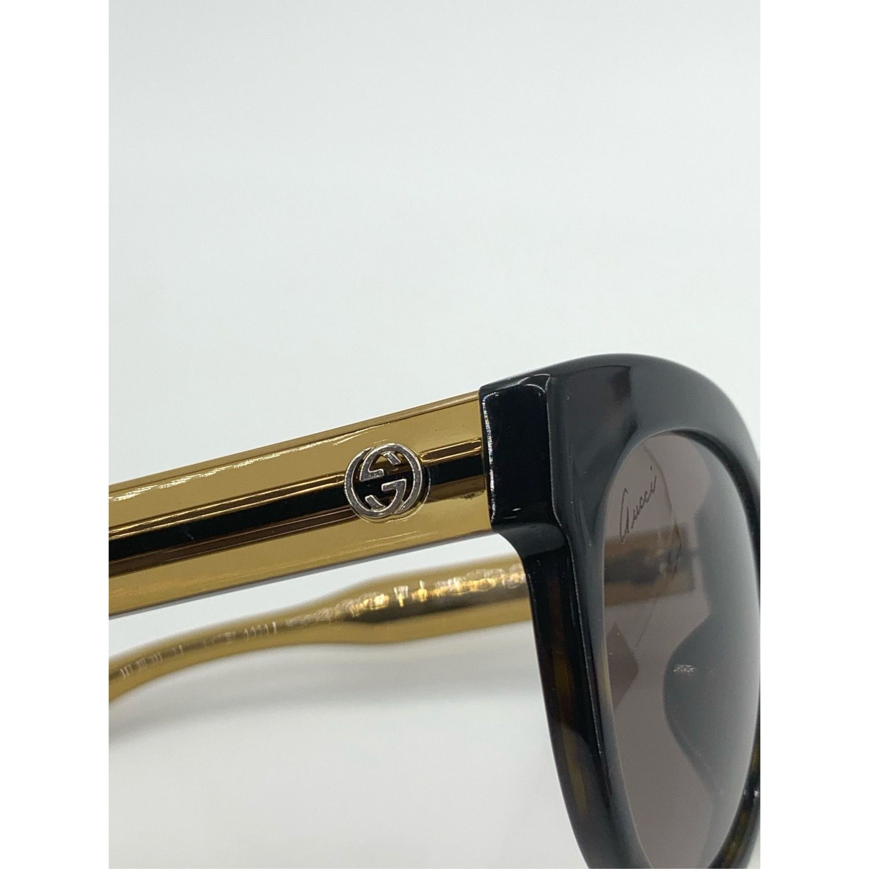 Gucci Womens Black & Gold Cat-Eye Sunglasses With Case