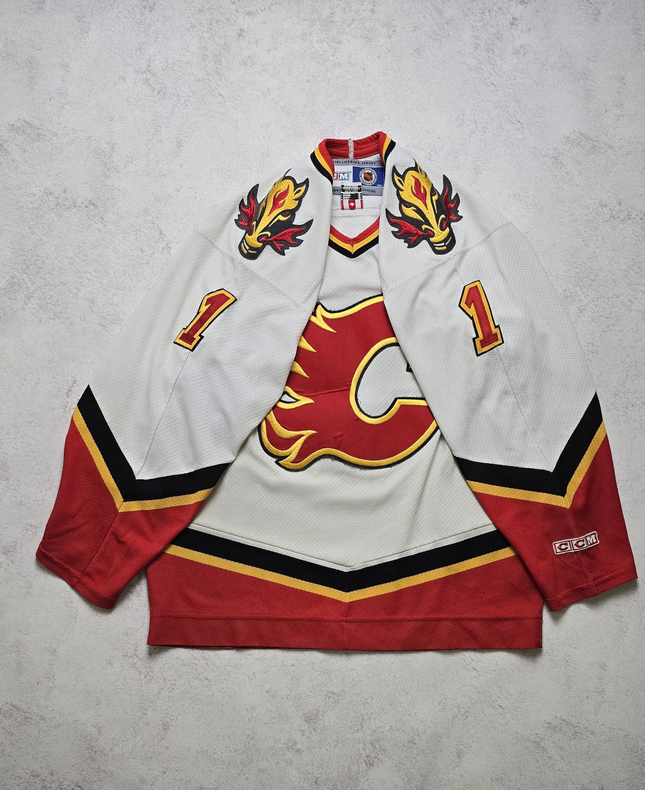 Ccm VTG CCM Air-Knit Calgary Flames Dolan #1 NHL Hockey Jersey Size US M / EU 48-50 / 2 - 2 Thumbnail