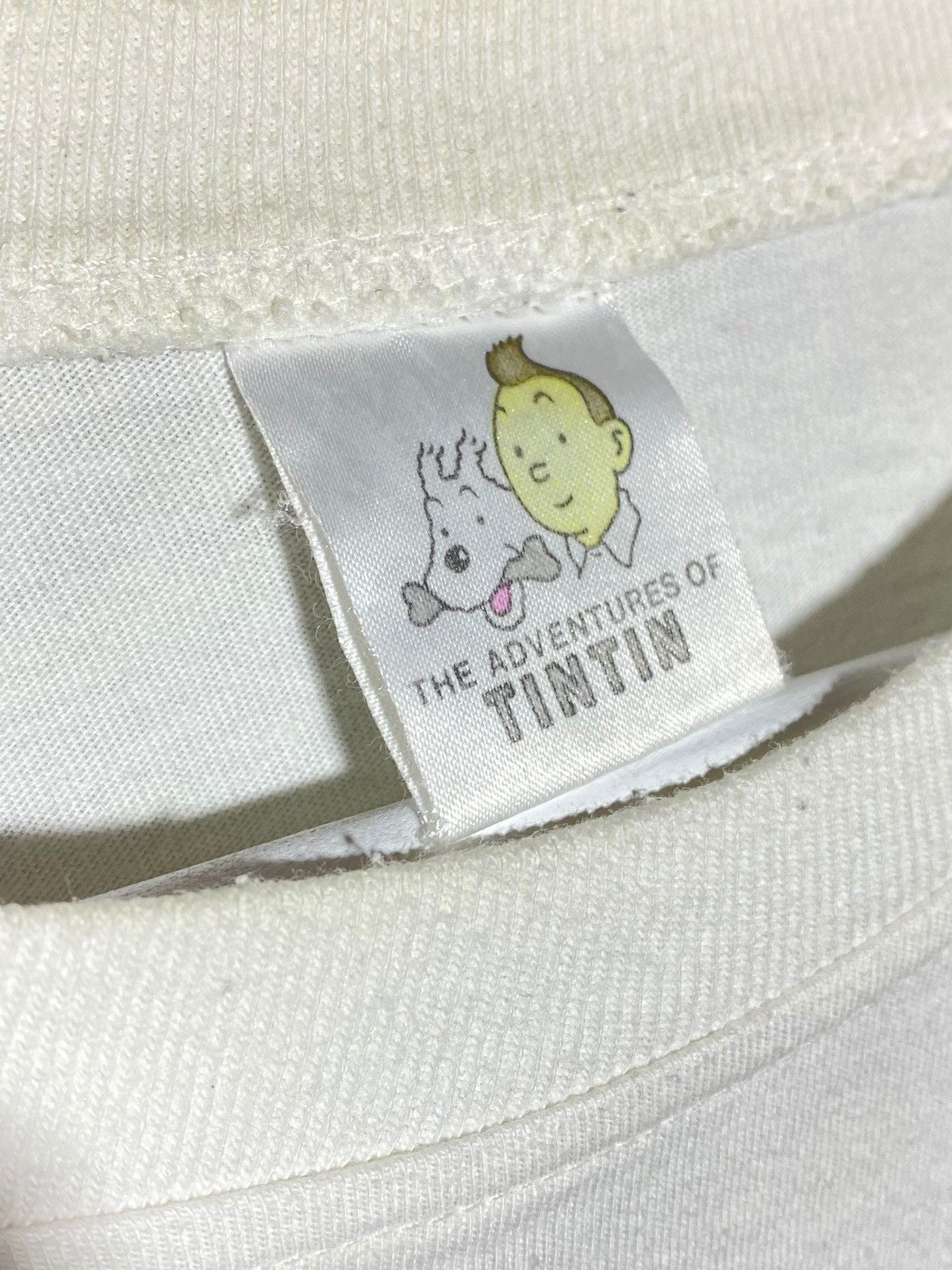 Cartoon Network 🔥 TINTIN IN AMERICA 90s GRAPHIC TEE USA INDIGENOUS VIBES Size US M / EU 48-50 / 2 - 11 Thumbnail