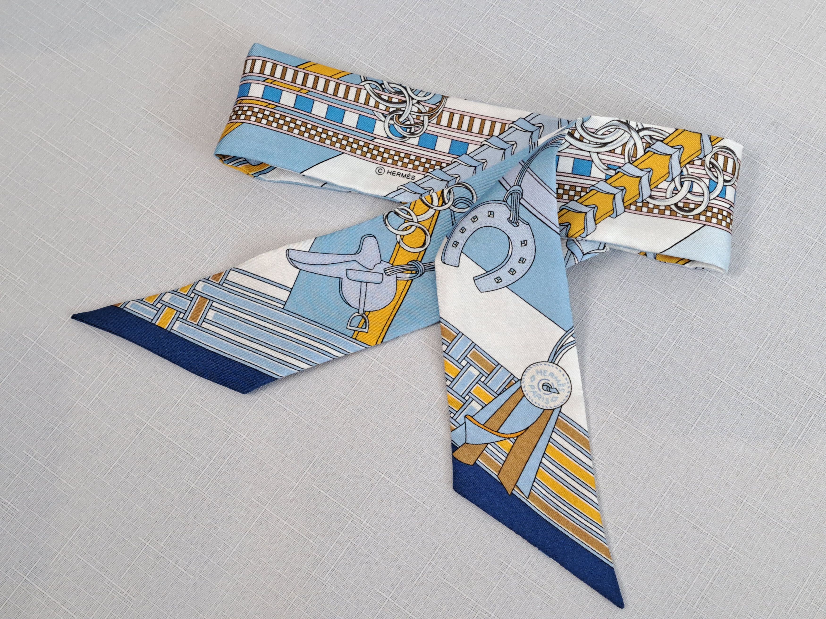 HERMES Paris silk twilly scarf.