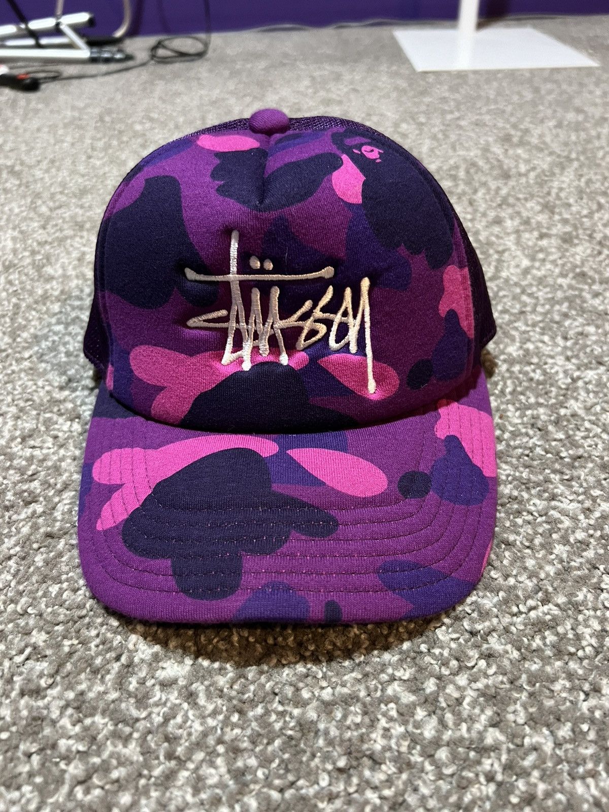 image of Bape x Stussy Trucker Cap in Purple, Men's