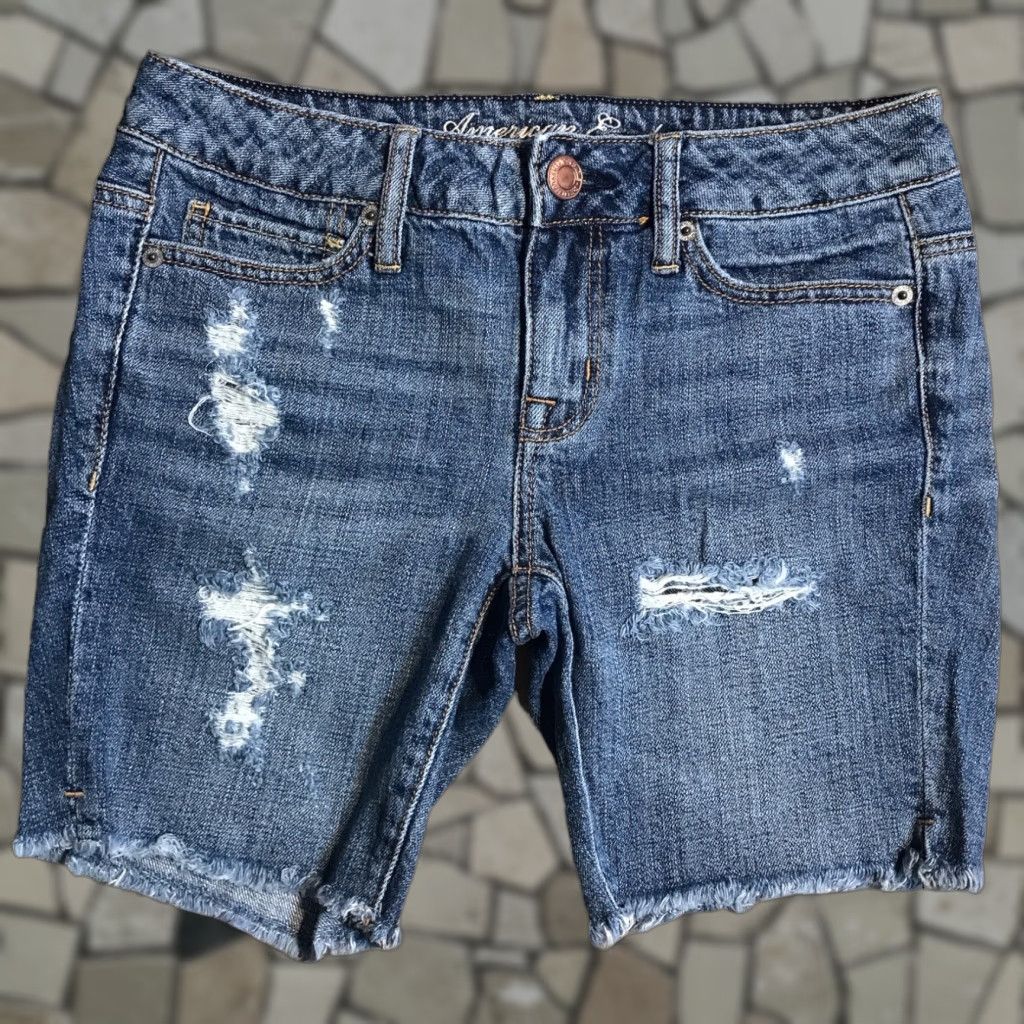 American Eagle Outfitters American Eagle Outfitters Shorts Denim Blue 00 Regular 7 in Inseam 7.5 in Rise Medium Wash Distressed Raw Hem 5-Pocket Zipper Button Womens Shorts Size 24" / US 00 / IT 34 - 1 Thumbnail