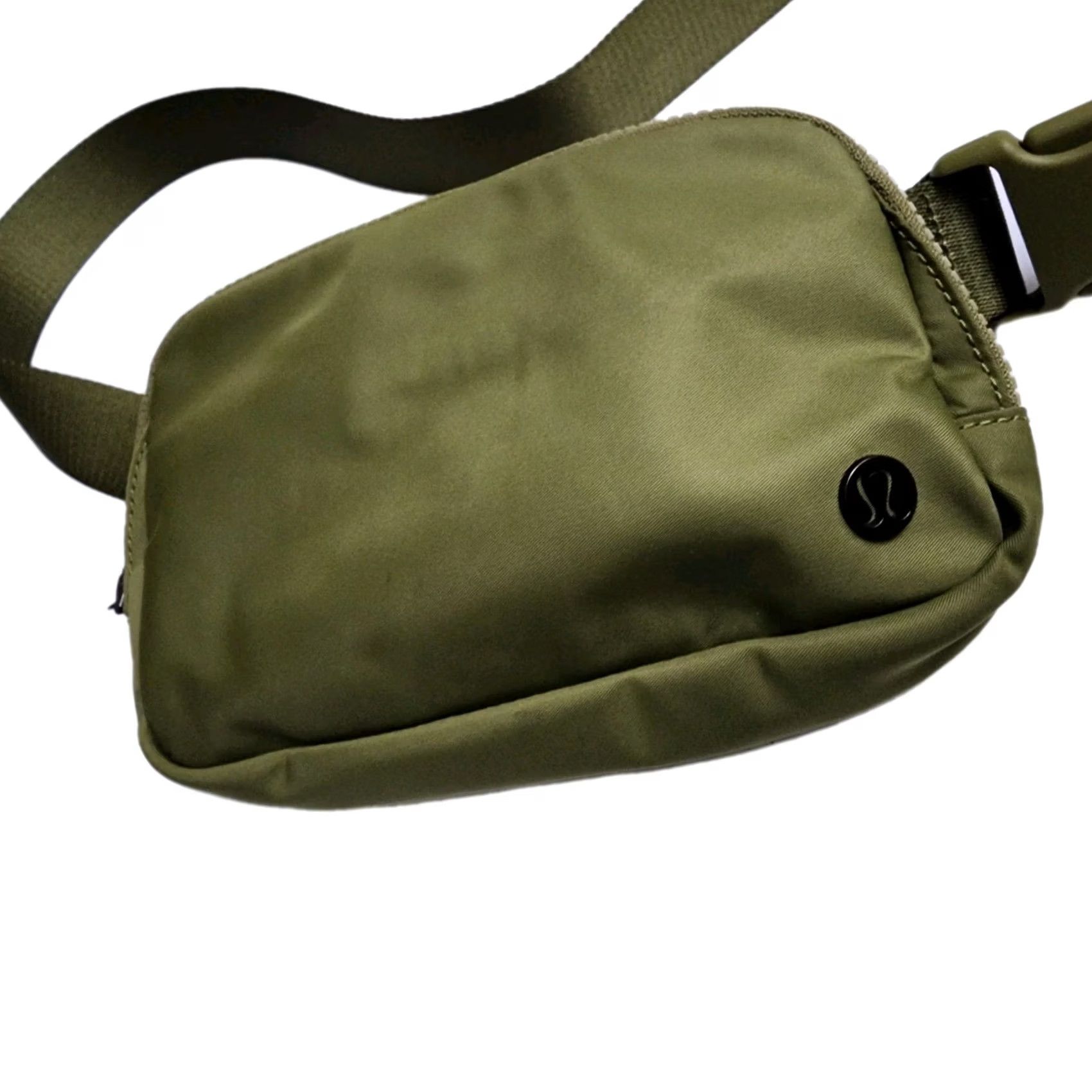 lululemon 1l bag Athletica Everywhere Belt (Tidewater Teal) tuck the excess belt bag strap into the elastic loops. Lululemon Everywhere Belt Bag 1L