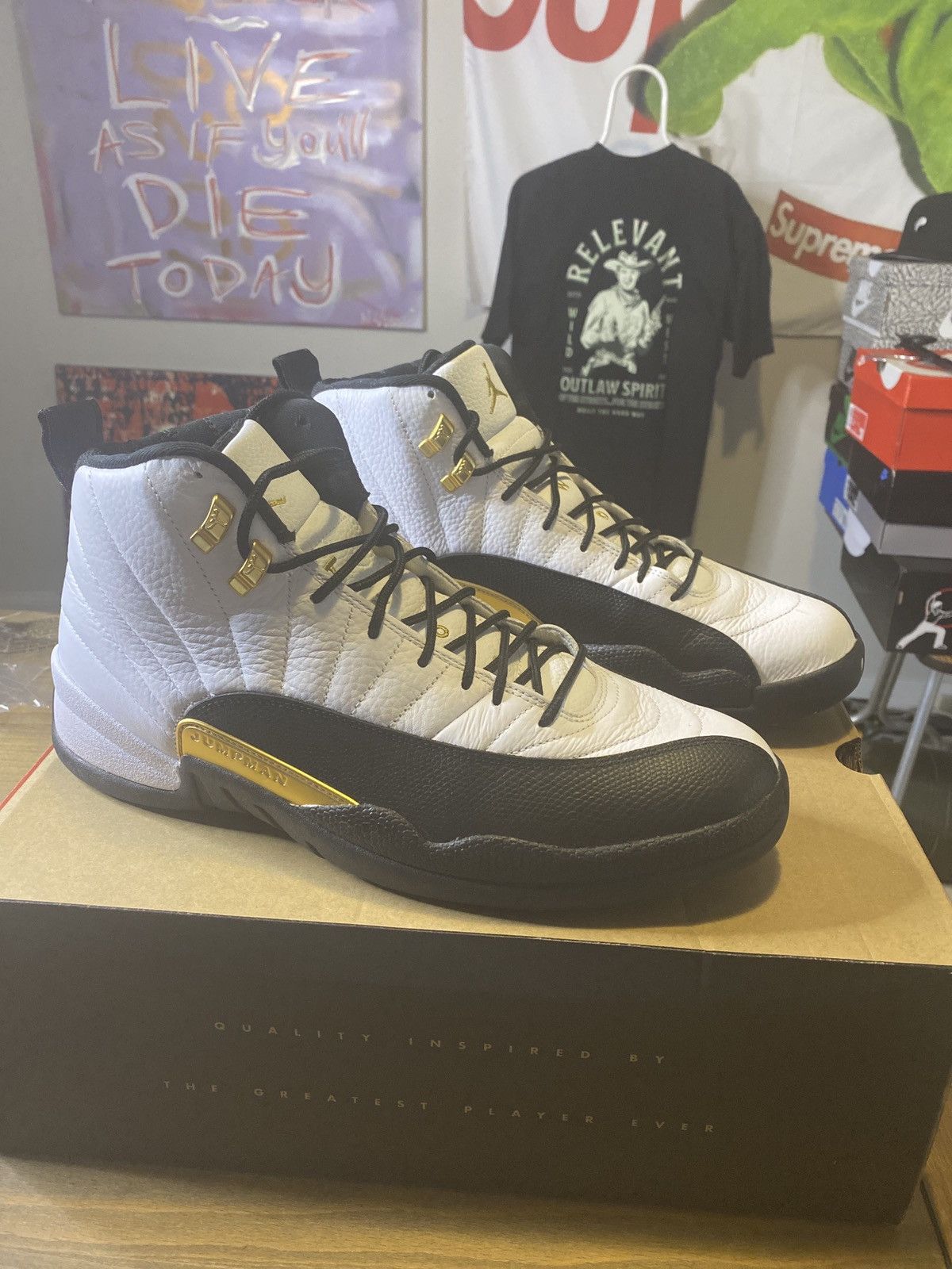 image of Jordan Brand 12 Royalty Taxi Shoes in Black, Men's (Size 13)