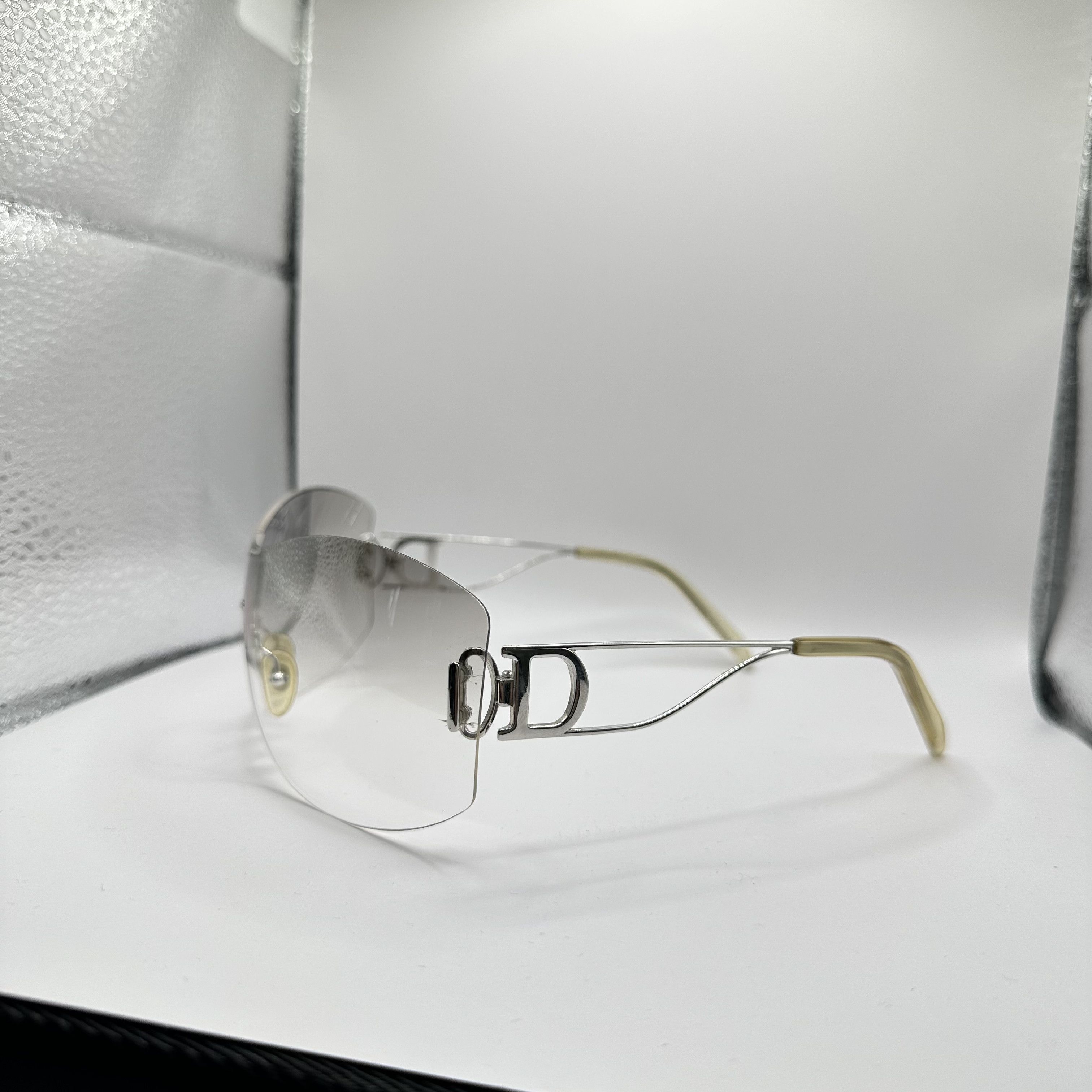 Y2k online dior miss diorella clear rimless sunglasses