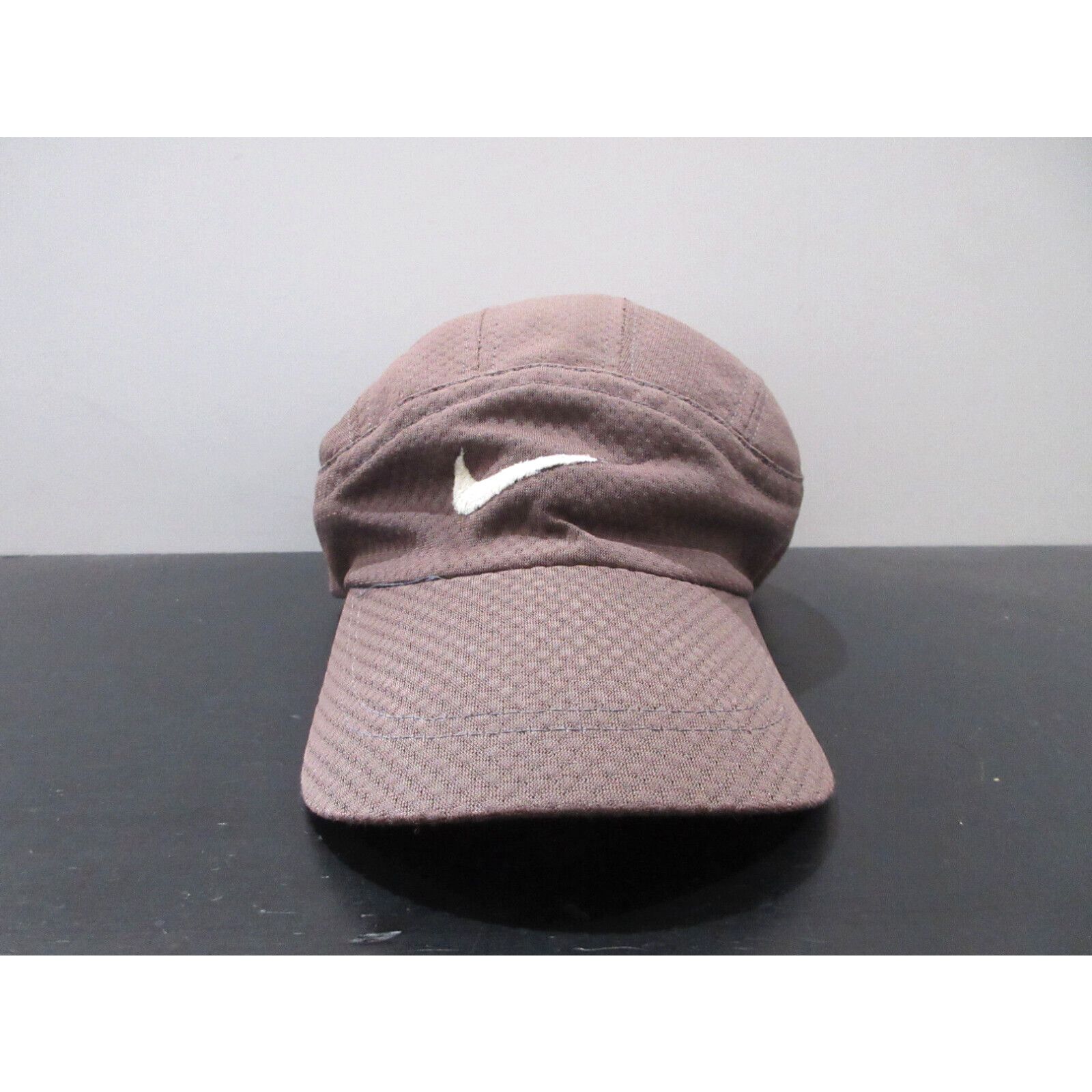 image of Vintage Nike Hat Cap Strap Back Brown White Panel Swoosh Athletic Logo Mens 90's
