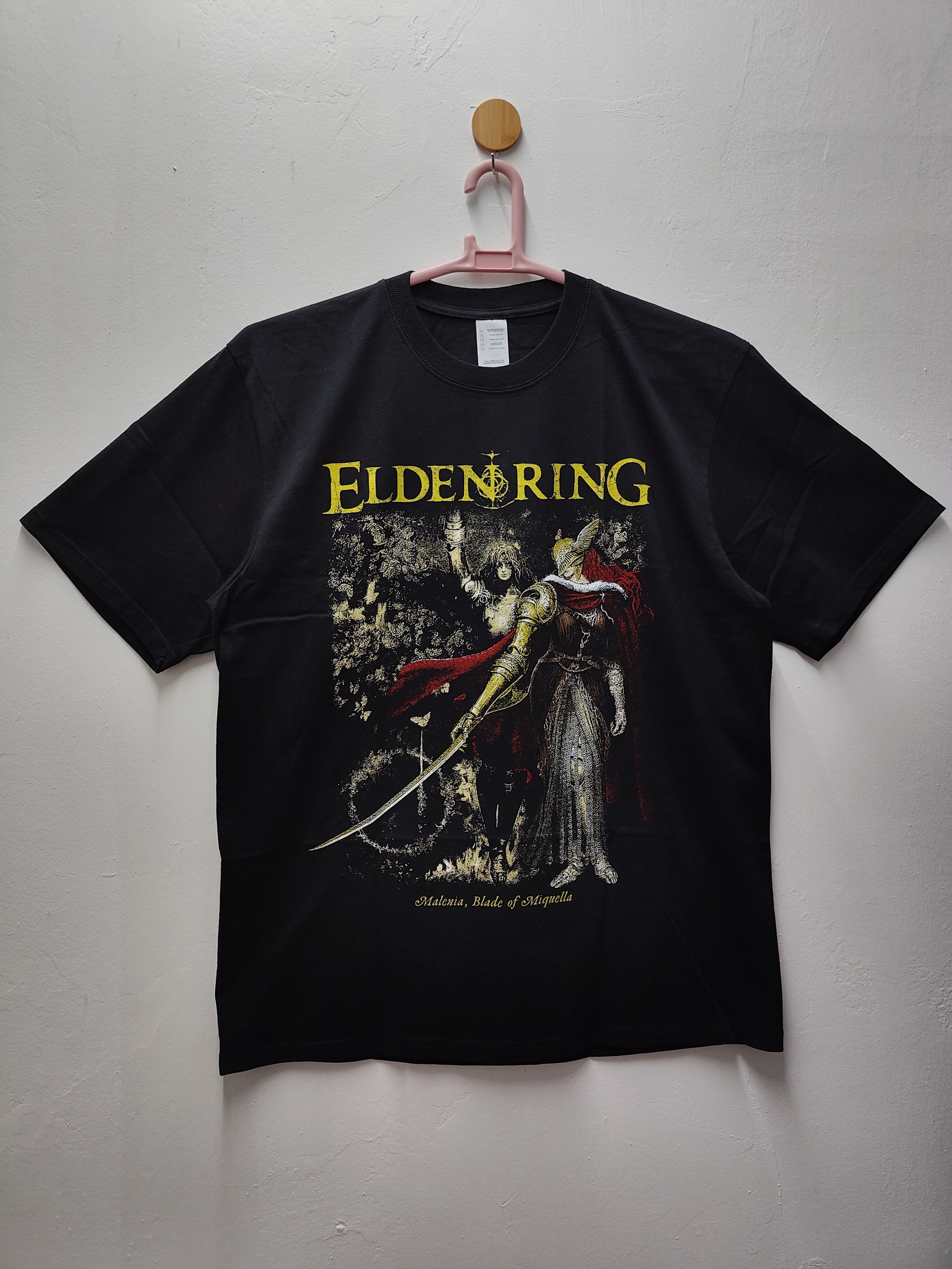 Image of Exclusive Game x Playstation Elden Ring "milenia, Blade Of Miquella" T-Shirt in Black (Size XL)