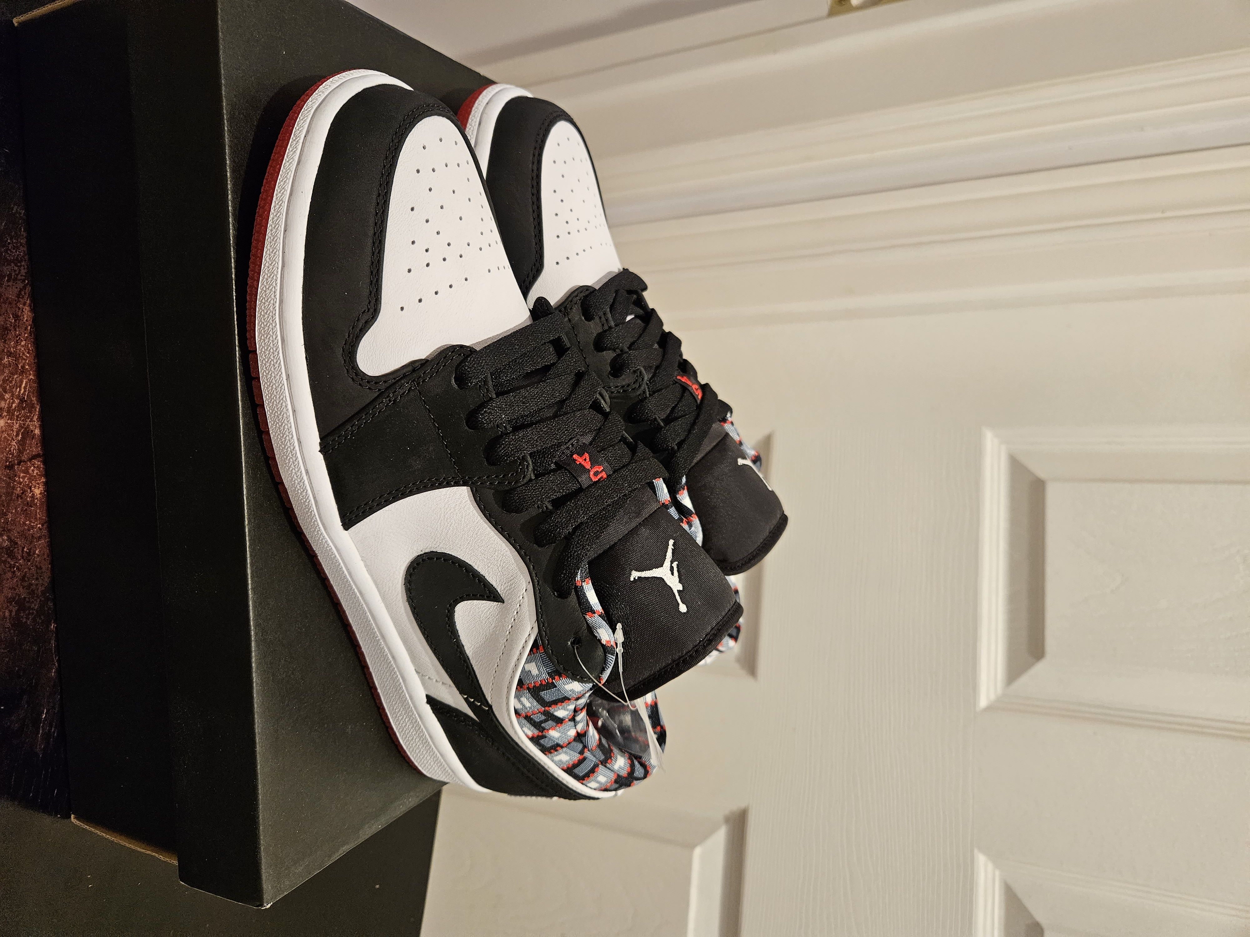 image of Air Jordan 1 Low Quai 54 (2021) Shoes in Black/White/Red, Men's (Size 9)