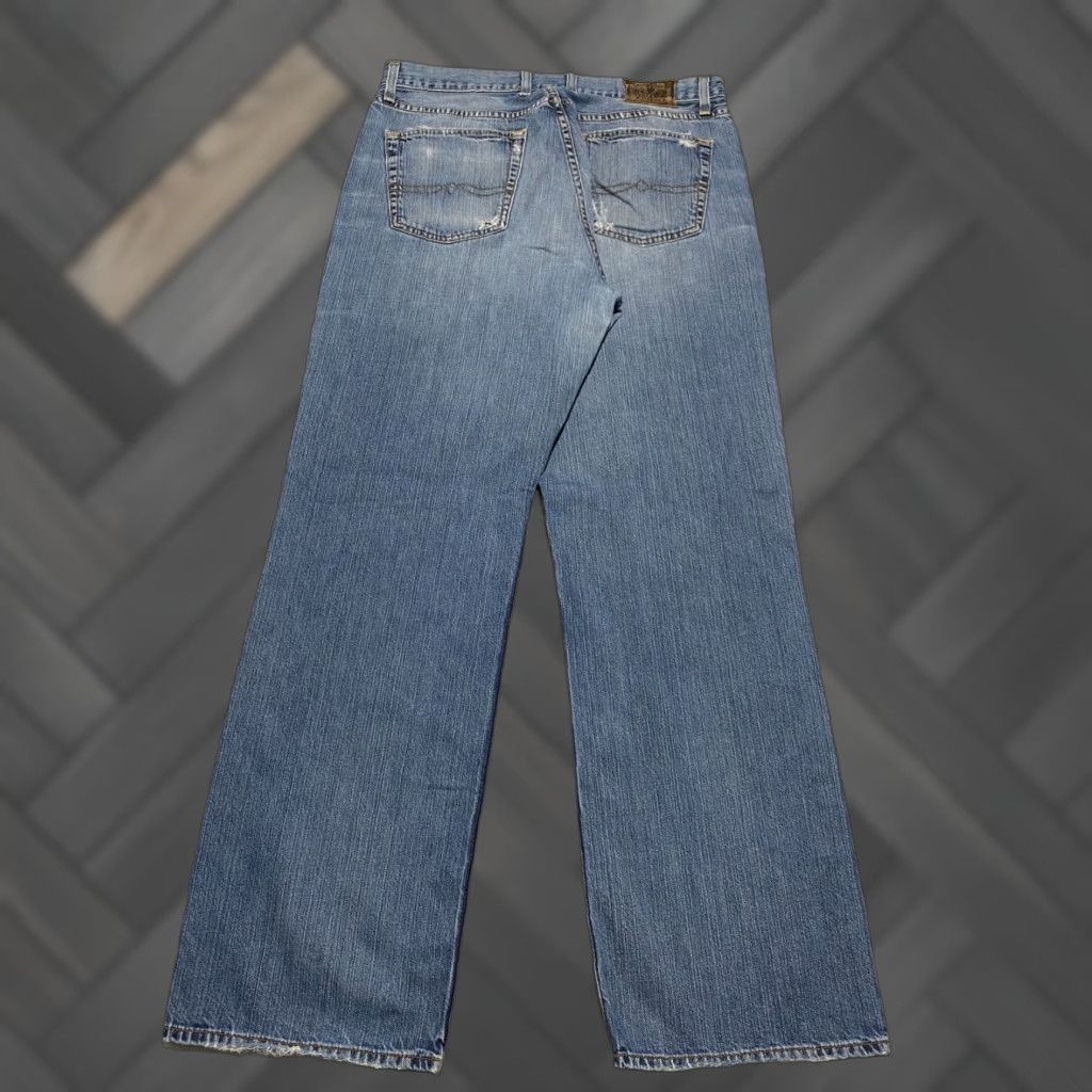 Lucky Brand VINTAGE Lucky Brand Jeans Mens 34 Blue Denim 5-Pocket Button Rise Mid Distressed Logo Cotton Straight 33 Inseam Regular Waist 34 California Mexico Size US 34 / EU 50 - 1 Thumbnail