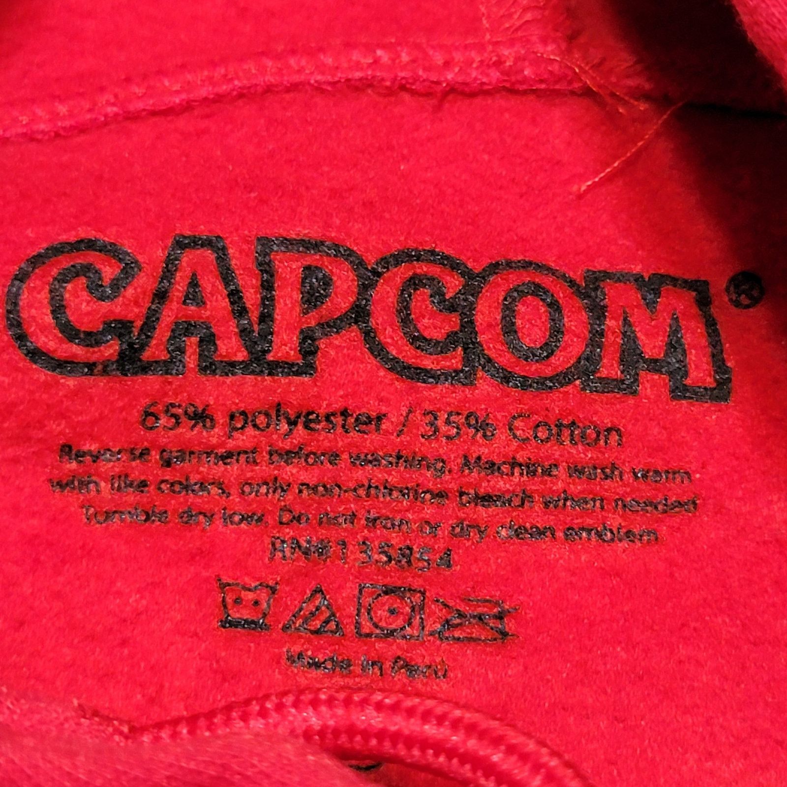 Other Capcom LS Pullover Hoodie "Street Fighter Legend" - Size XL Size US XL / EU 56 / 4 - 7 Thumbnail