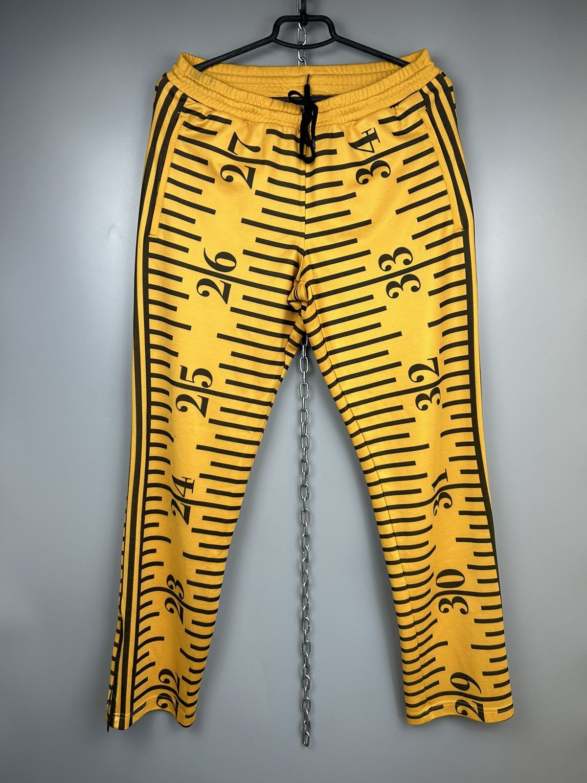 image of Adidas Jeremy Scott Tape Measure Track Pants in Yellow, Men's (Size 32)