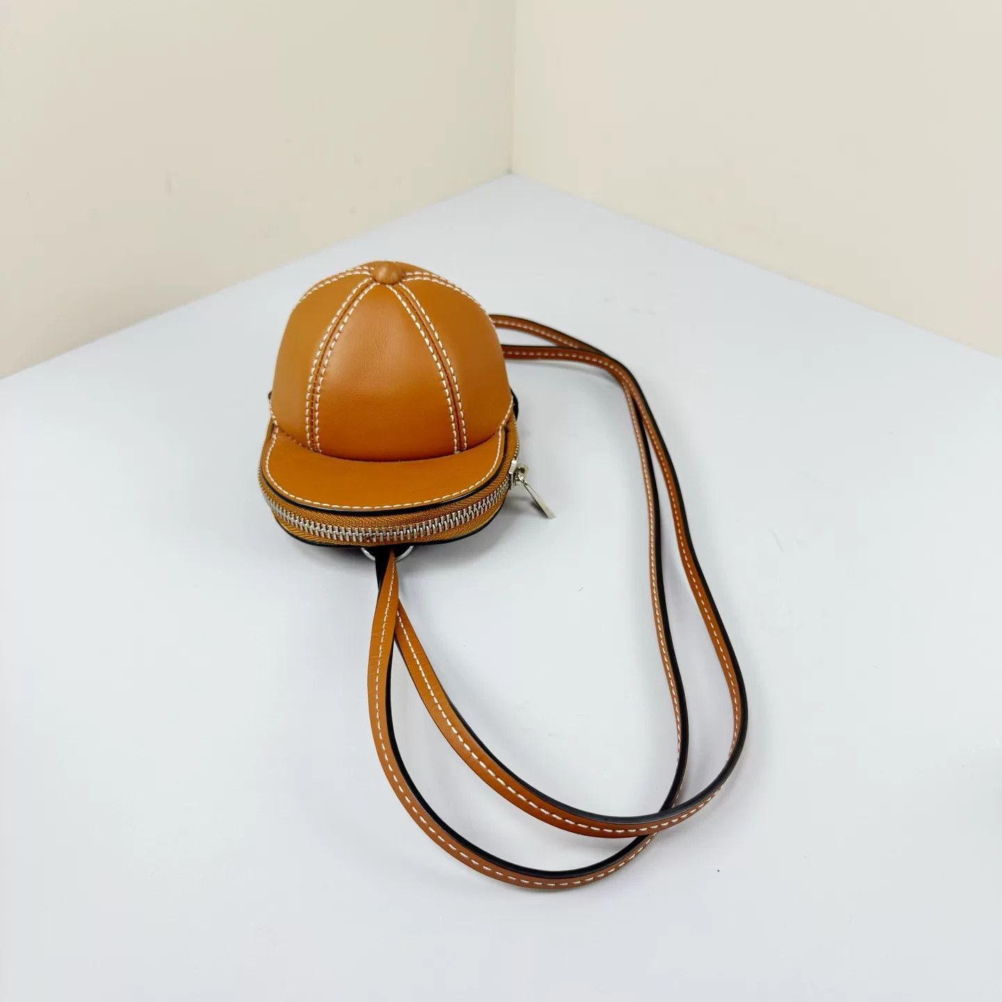 JW Anderson JW Anderson Caramel Cowhide Hat Crossbody Size ONE SIZE - 1 Thumbnail
