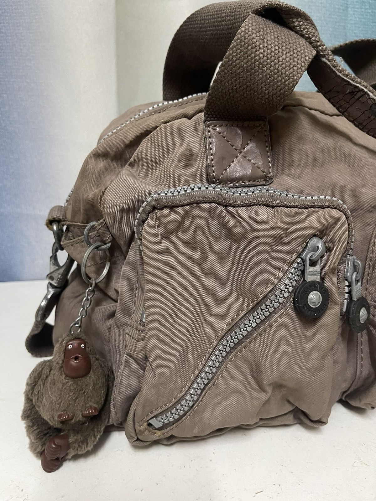 Japanese Brand 🦧KIPLING SLING BAG MULTIPOCKET UTILITIES BAPE Size ONE SIZE - 2 Thumbnail