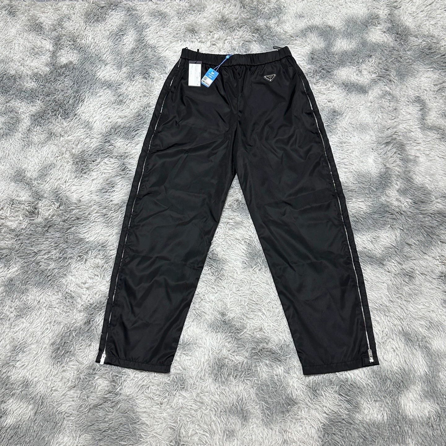Prada Prada SS17 grey nylon track pants with side zip | Grailed