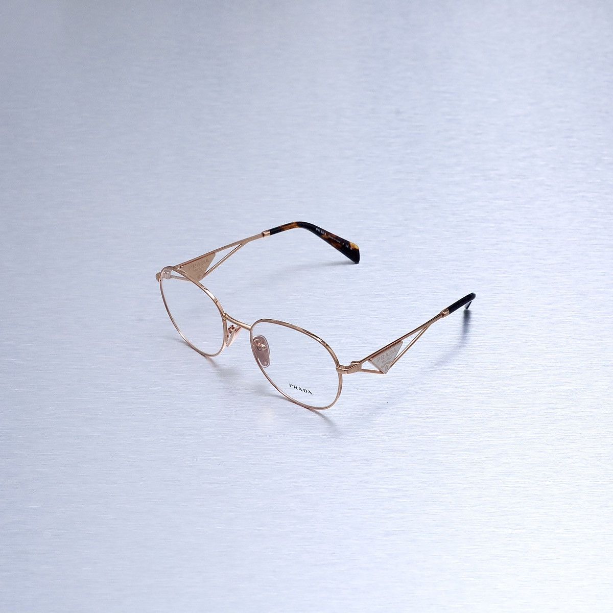 image of Prada 0Pr A50V Glasses in Rose Gold, Men's