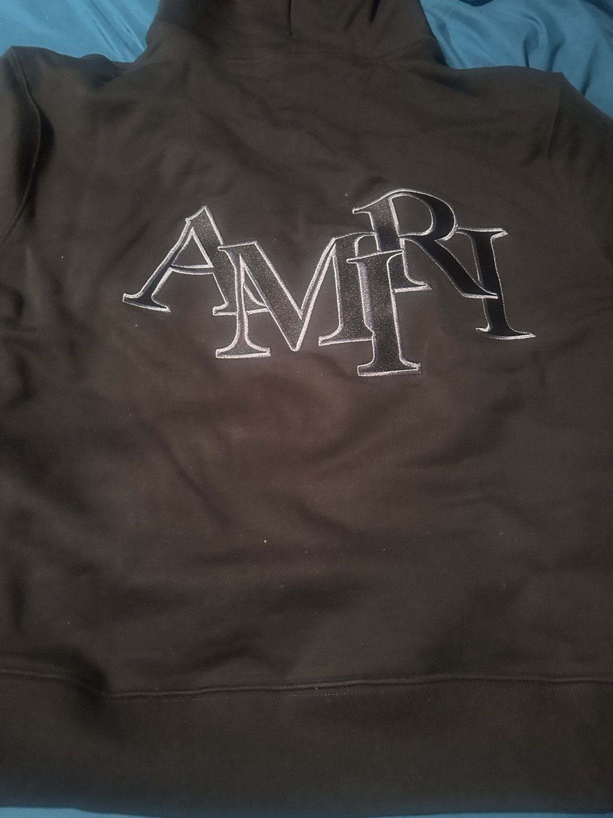 image of Amiri Staggered Logo Cotton Hoodie in Black, Men's (Size 2XL)