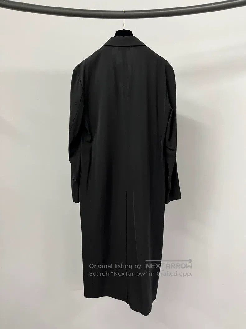 The row Black windbreaker coat