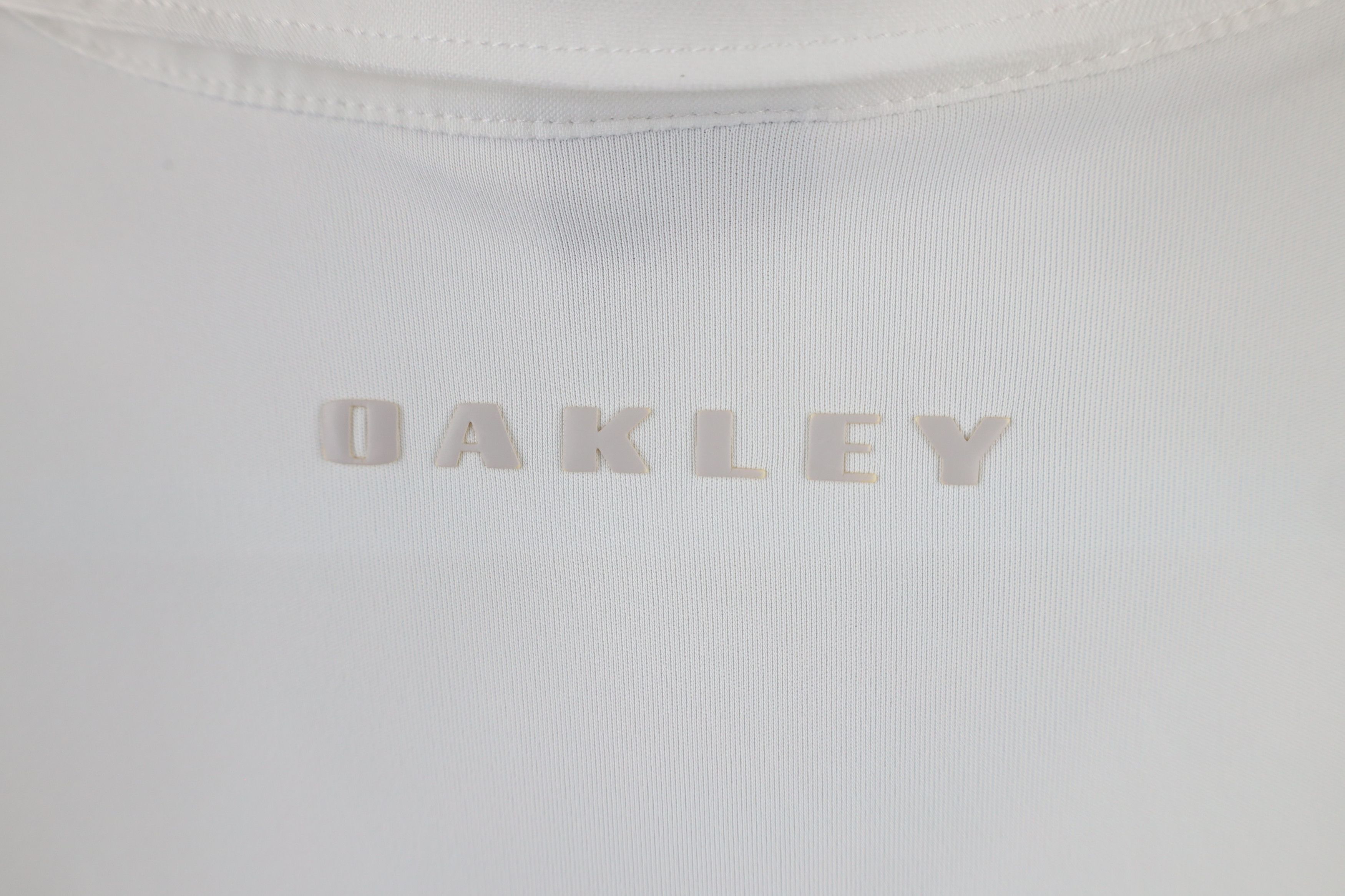 Oakley × Vintage Vintage Oakley Spell Out Vented Collared Polo Shirt White Size US L / EU 52-54 / 3 - 6 Thumbnail