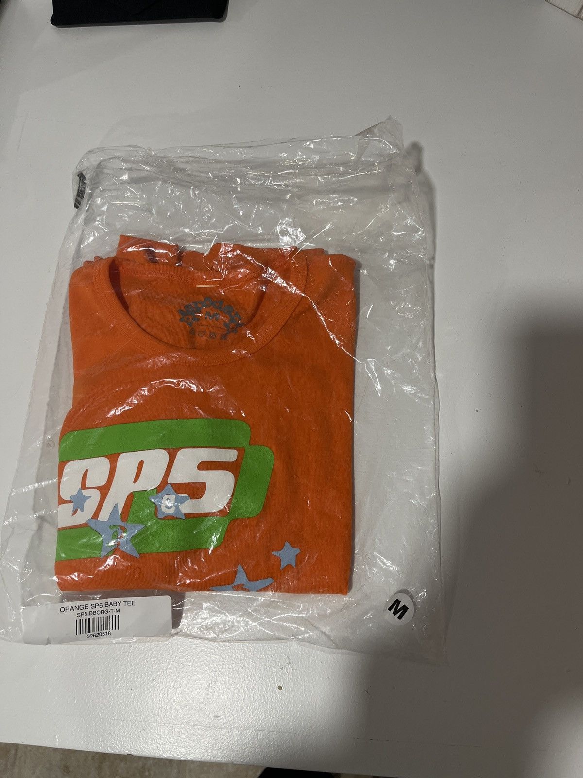 orange sp5 baby tee