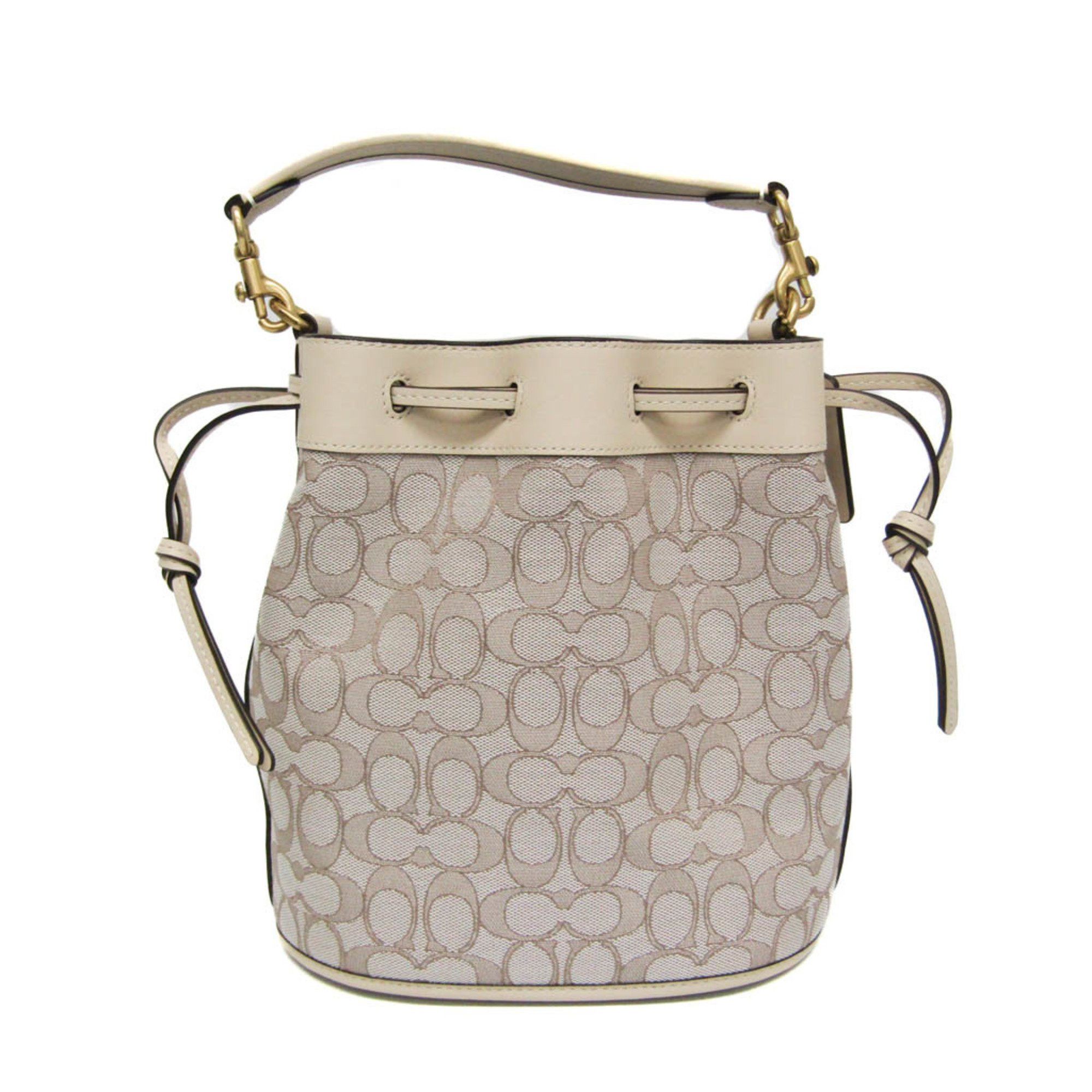 image of Coach Signature Field Bucket C3853 Women's Canvas,leather Baguette Bag,shoulder Bag Light Beige