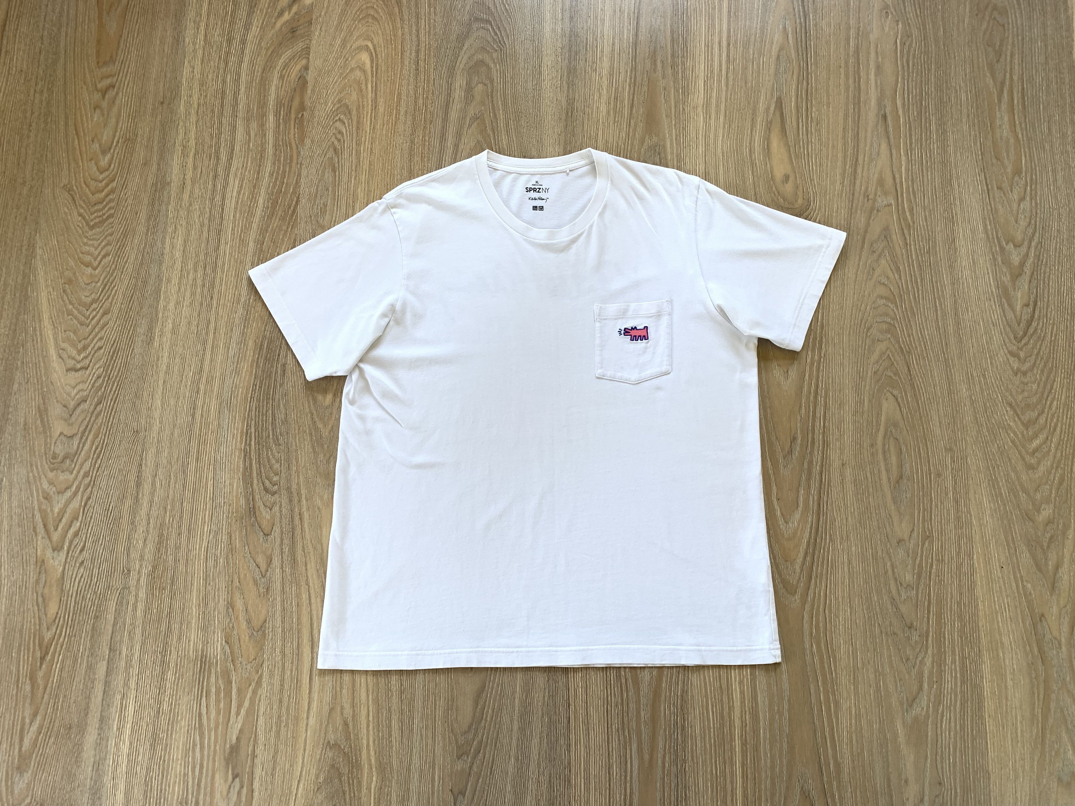 Japanese Brand × Keith Haring × Uniqlo Keith Haring Uniqlo White Pocket T Shirt Size US XL / EU 56 / 4 - 1 Thumbnail