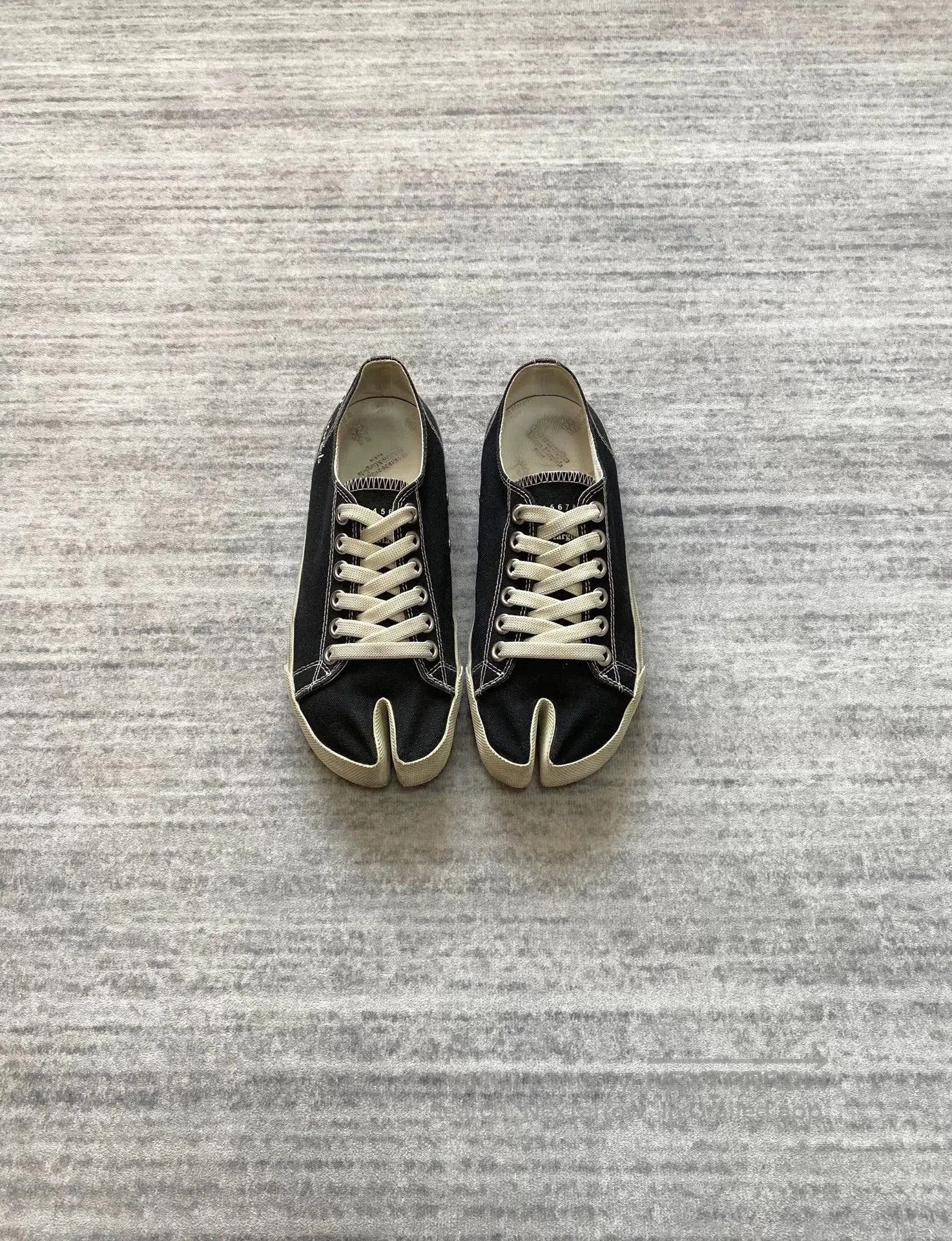 Margiela Black and White Tabi Canvas Shoes.