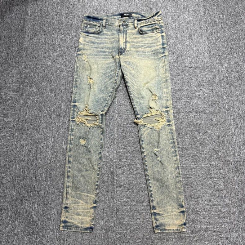 Amiri mud-dyed washed and destroyed jeans -DMC