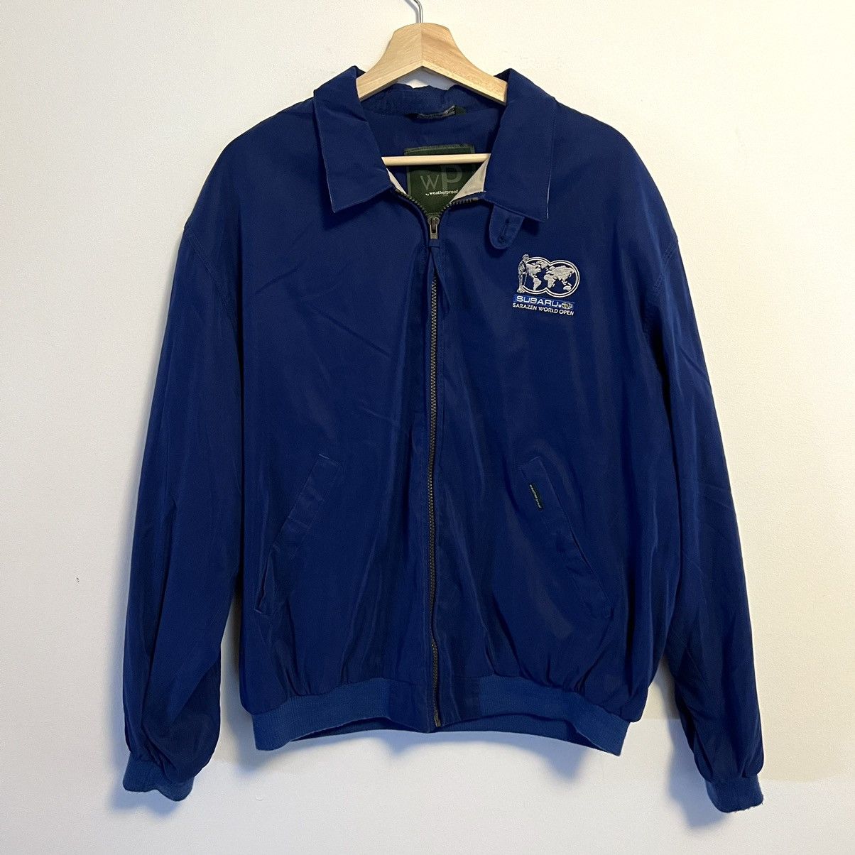 image of Vintage x Weatherproof Y2K Weatherproof Subaru Sarazen World Open Bomber Jacket in Blue (Size Large