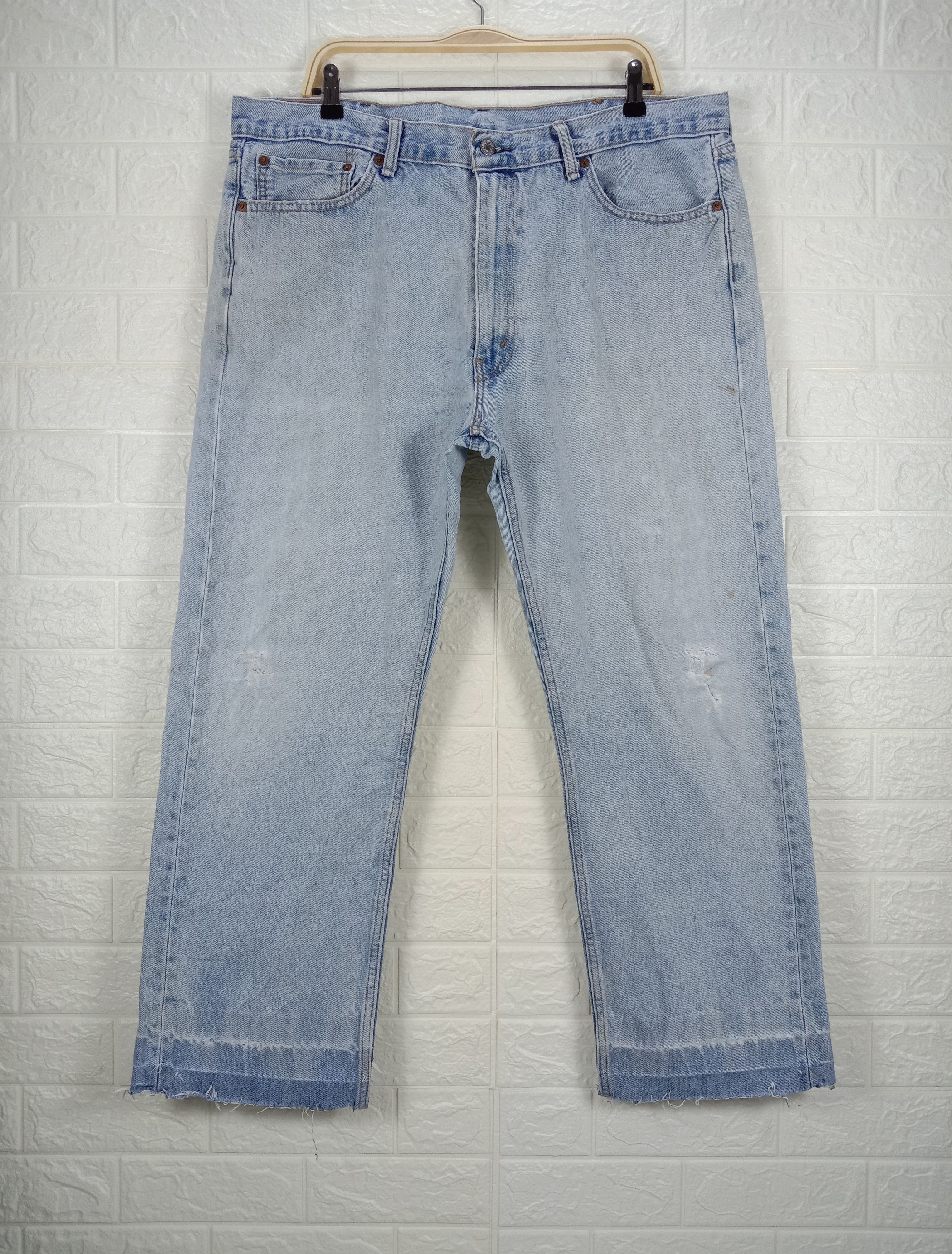 Vintage Levi's 505 Jeans Light Wash Distressed Denim