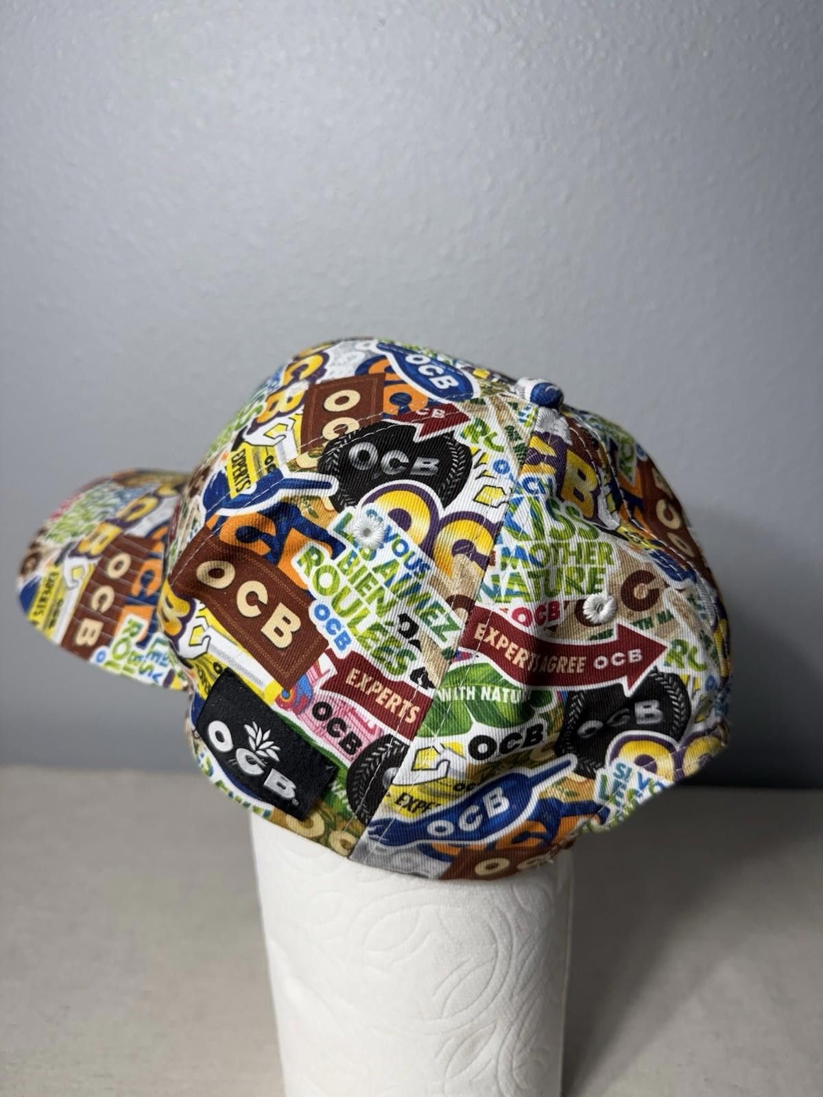 The Unbranded Brand OCB Collage Snap Back Baseball Cap – Size ONE SIZE - 6 Thumbnail