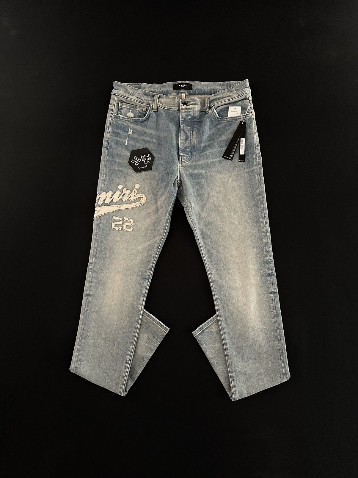 image of Amiri 22 Leather Varsity Applique Denim Jeans in Blue, Men's (Size 36)