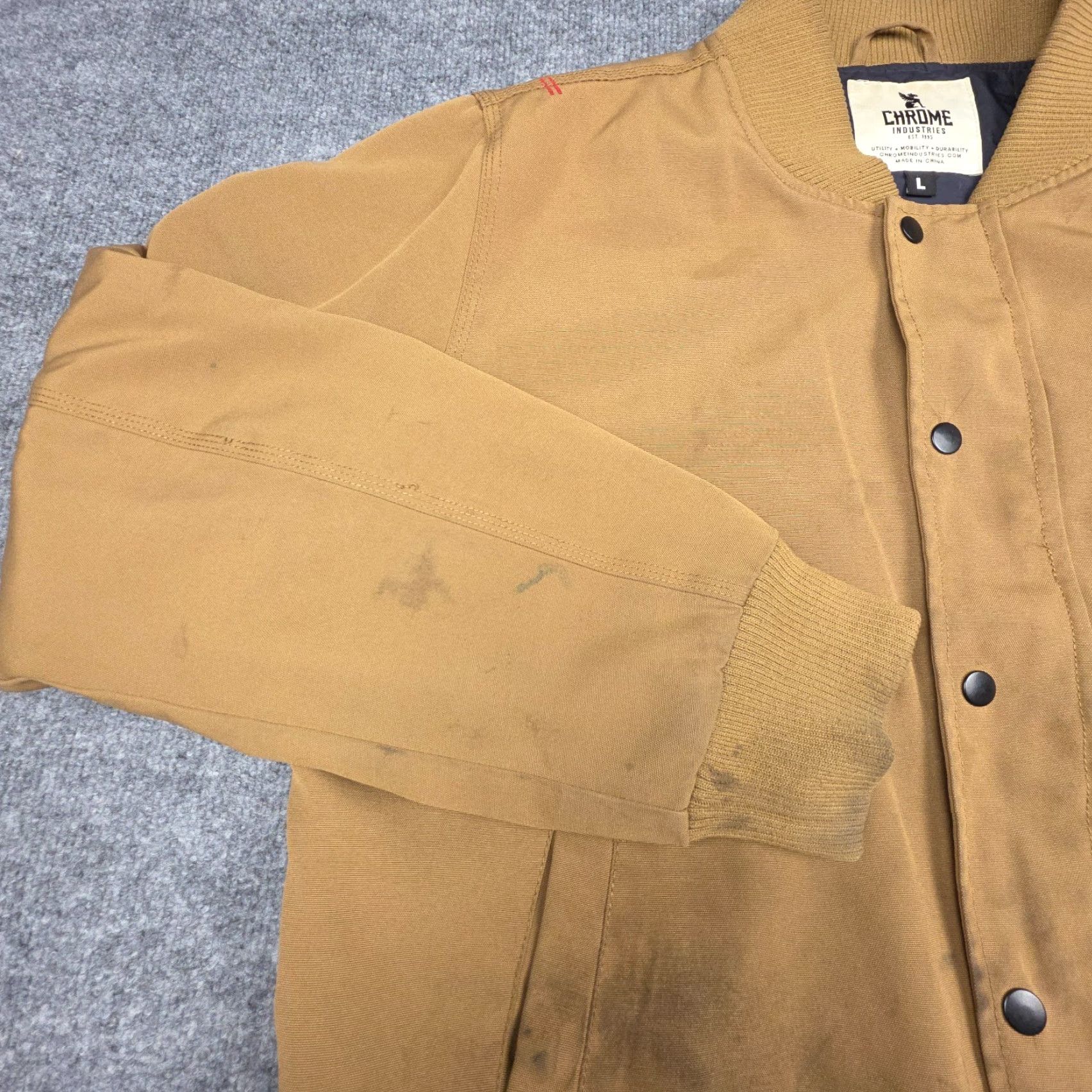 Industrie **Chrome Industries Large Men's Beige Stained Bomber Jacket** User: **Chrome Industries Men's Large Beige Stained Bomber Jacket** Size US L / EU 52-54 / 3 - 5 Thumbnail