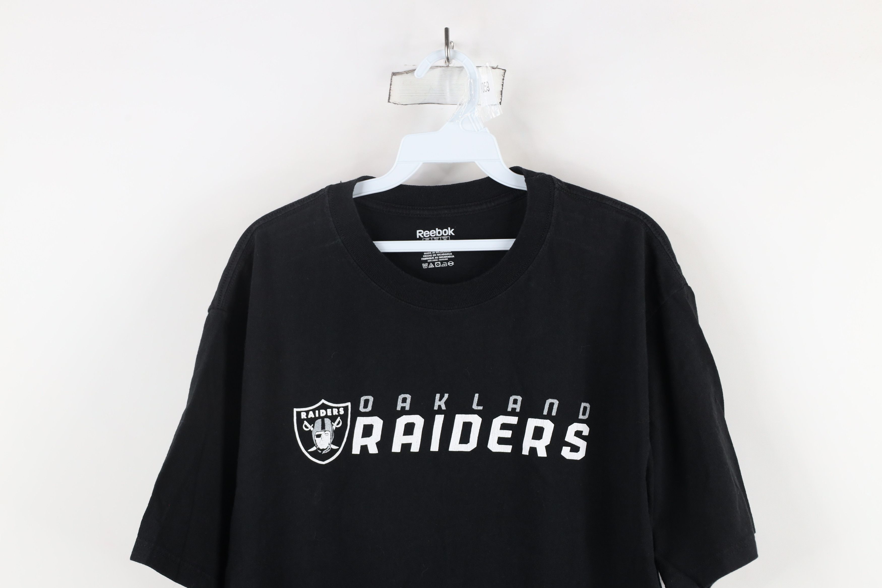 Reebok × Vintage Vintage Reebok Out Oakland Raiders Football T-Shirt Black Size US XL / EU 56 / 4 - 2 Thumbnail