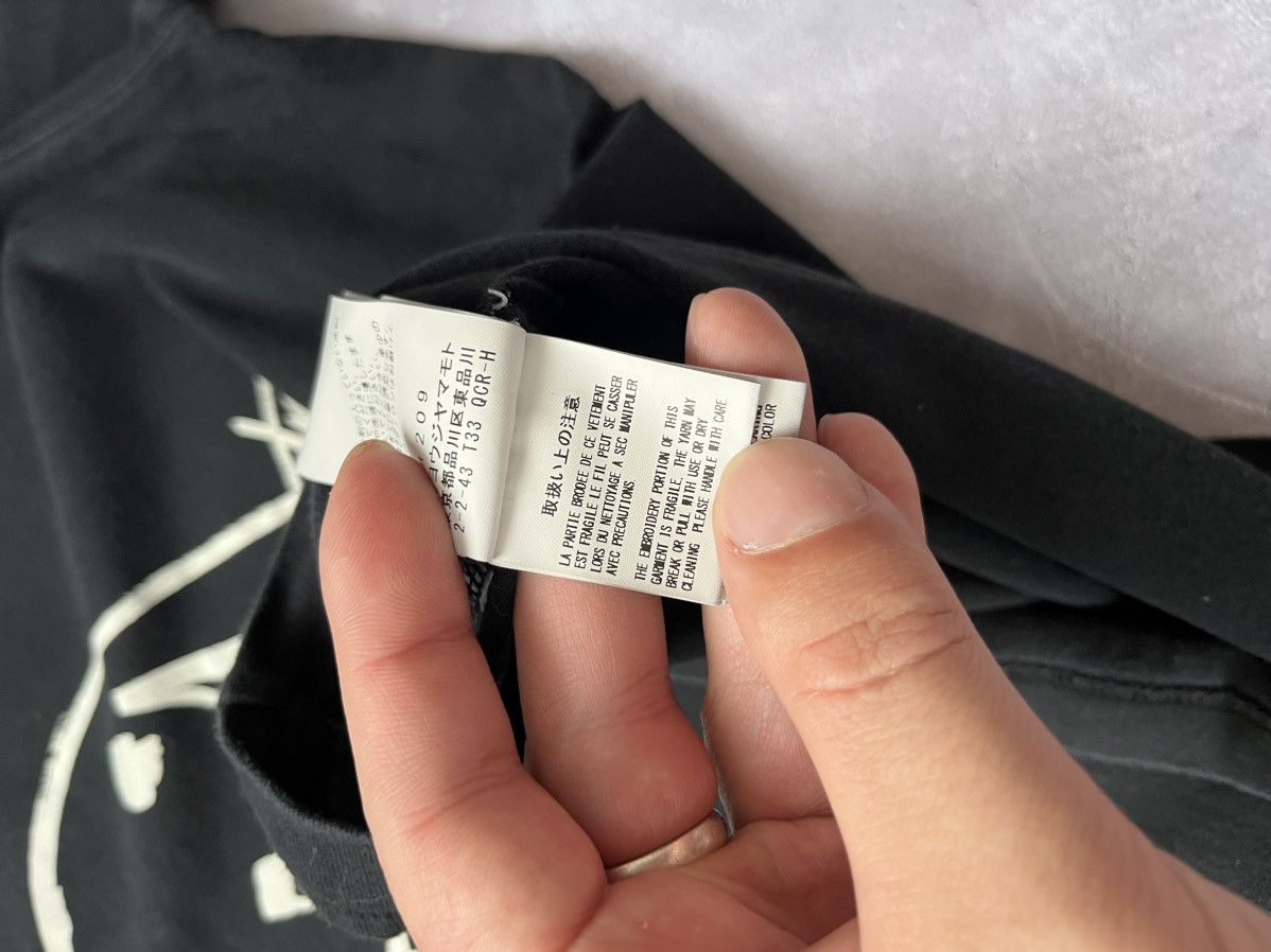 New Era × Yohji Yamamoto Rare New Era X Yohji Yamamoto Black T-Shirt Tee Size L / 4 Size US L / EU 52-54 / 3 - 9 Thumbnail