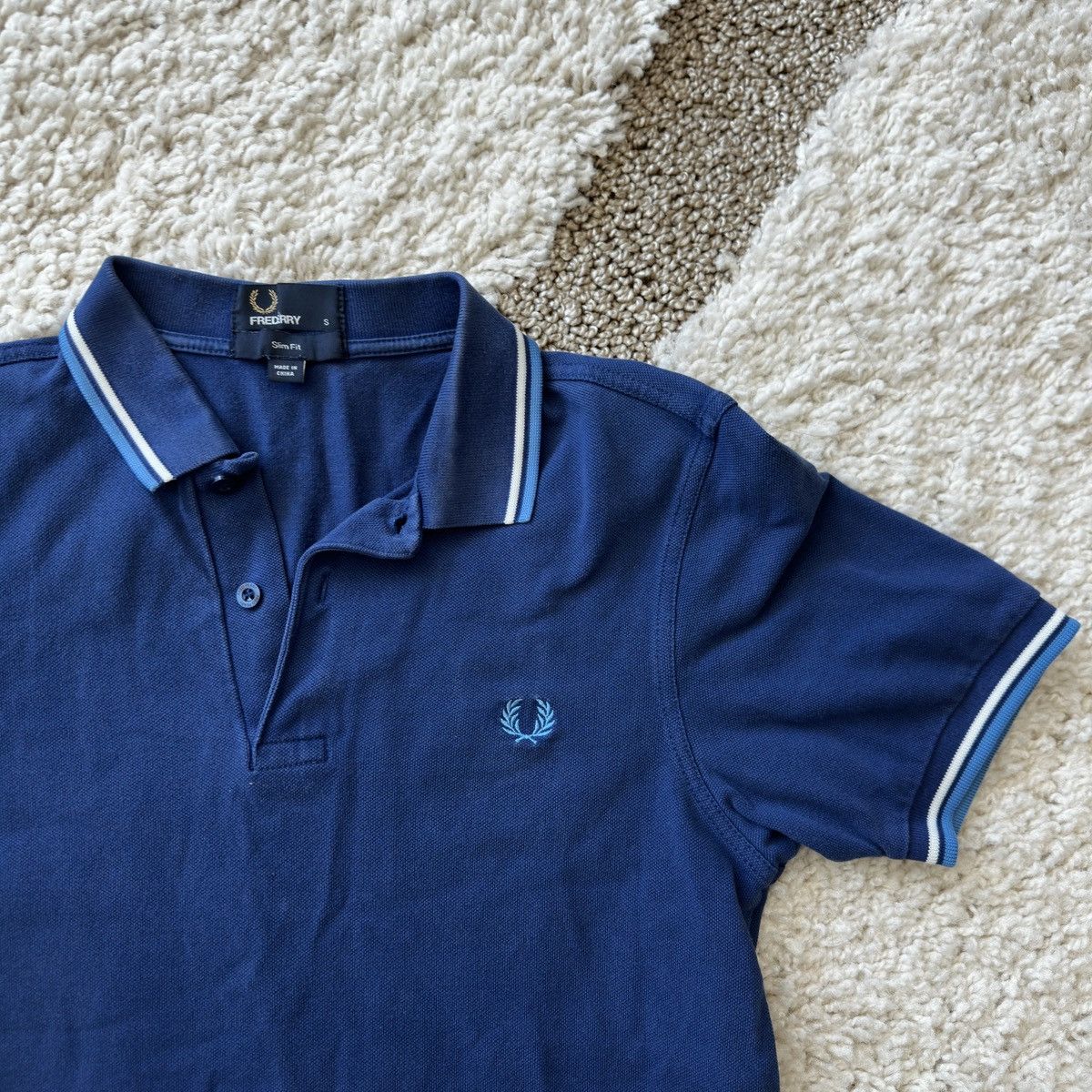 Twin tipped blue/sky blue/white polo