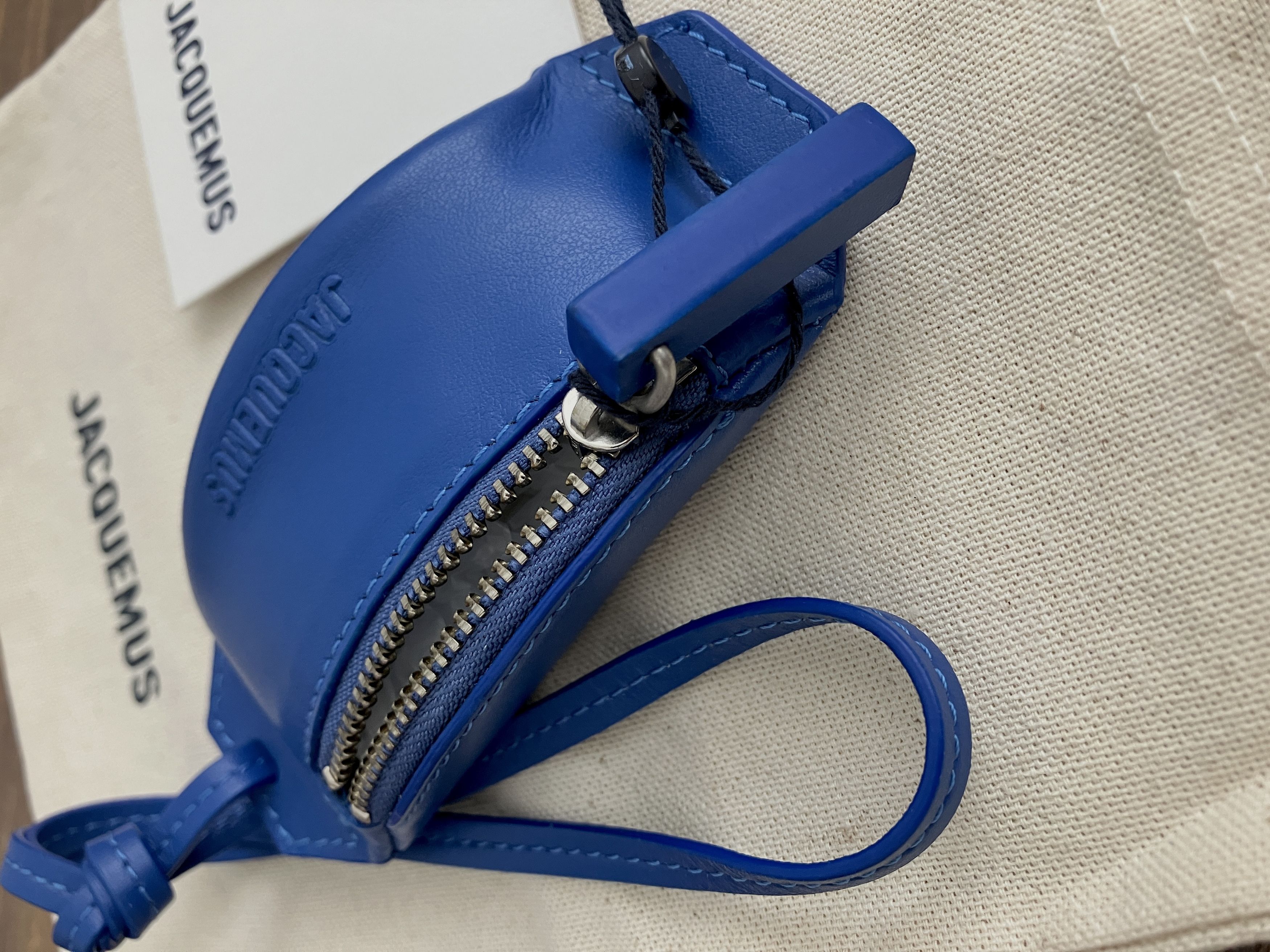 image of Jacquemus La Banane Mini Pouch in Bleu, Men's