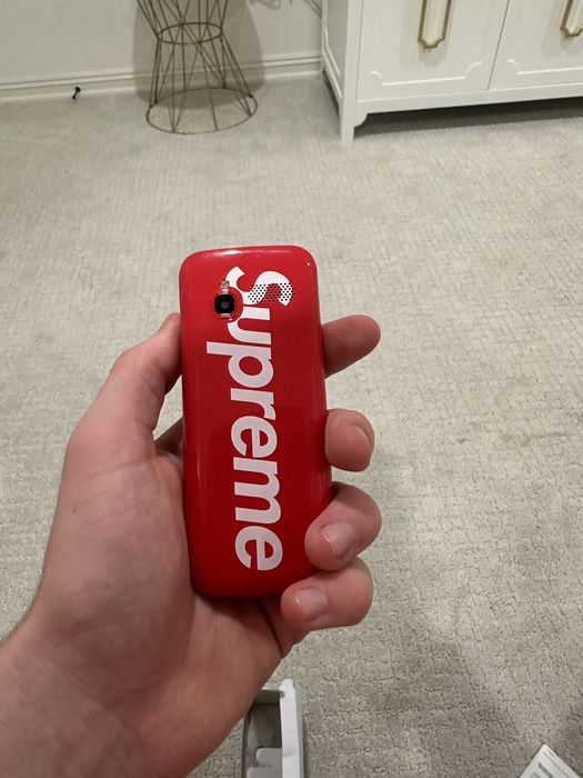 Supreme red best sale burner phone