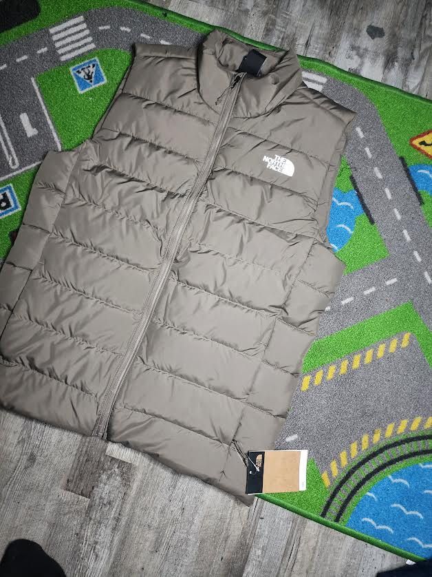 image of The North Face Puffer Vest in Falcon Brown, Men's (Size Medium)