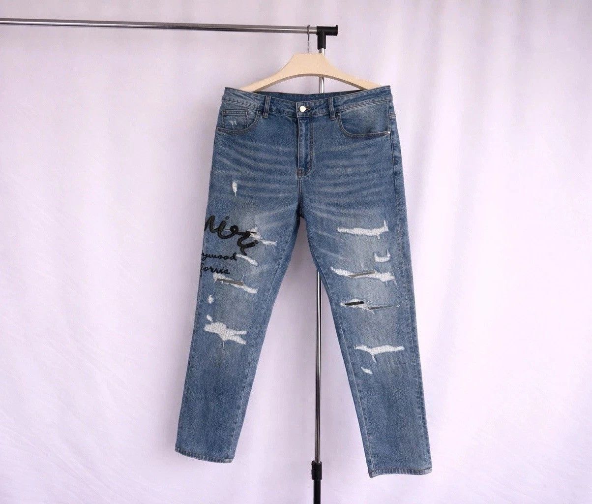 Amiri Men’s Ripped Denim Jeans Blue Wash, Signature Street