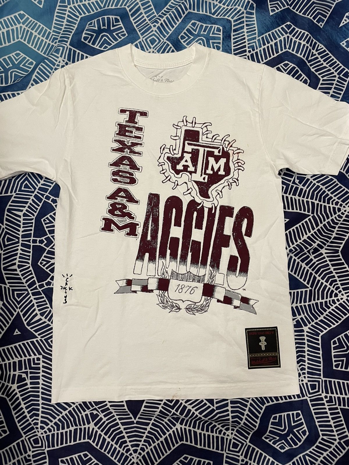 Mitchell & Ness × Travis Scott Travis Scott Mitchell & Ness Texas A&M Aggies Size US S / EU 44-46 / 1 - 1 Thumbnail