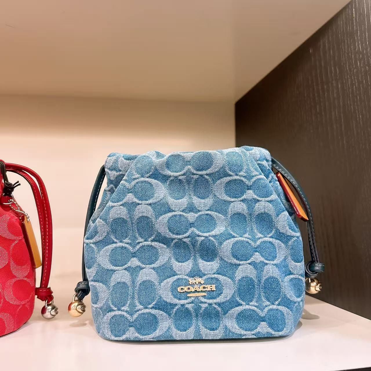 Coach Faye Mini Drawstring Bag In Signature Denim CDE32 Size ONE SIZE - 1 Thumbnail